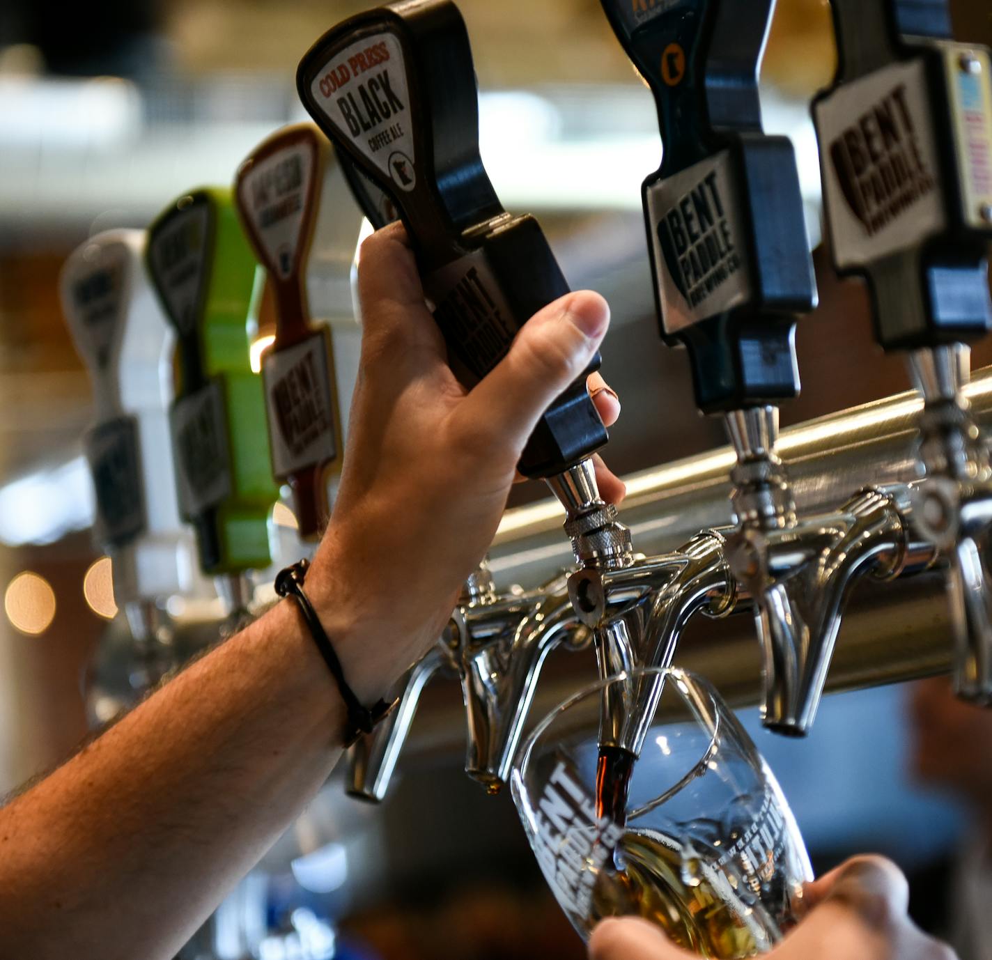 A bartender poured a Cold Press Black Coffee Ale Thursday at Bent Paddle Brewing Company. ] AARON LAVINSKY &#x2022; aaron.lavinsky@startribune.com Annual food travel issue heads to Duluth, where a lot of new restaurants are popping up. We photograph restaurants and scenic Duluth on Wednesday, June 6 and Thursday, June 7, 2018.