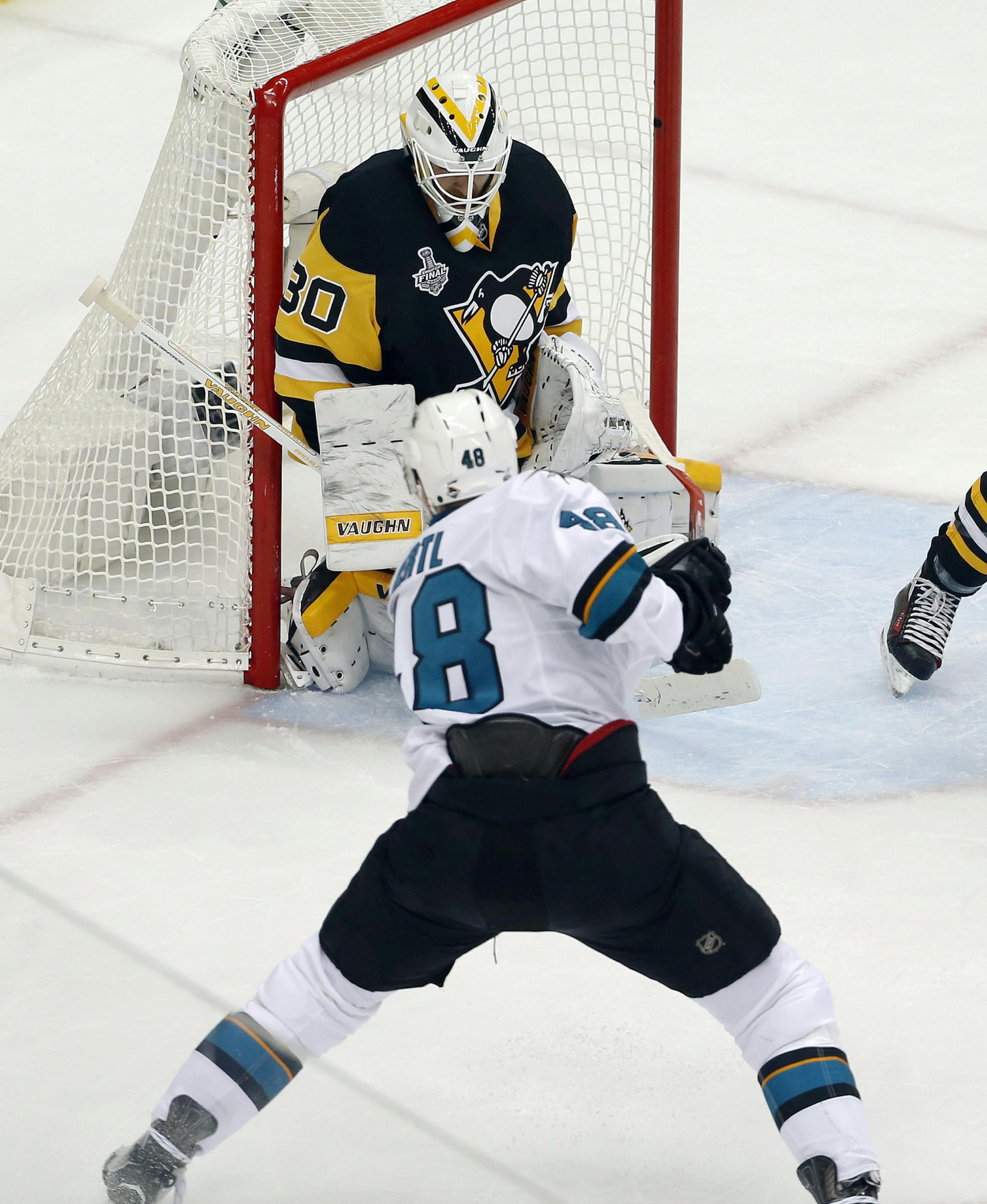San Jose Sharks' Tomas Hertl (48) shoots against Pittsburgh Penguins goalie Matt Murray (30) during the first period in Game 2 of the NHL hockey Stanley Cup Finals on Wednesday, June 1, 2016, in Pittsburgh. (AP Photo/Gene J. Puskar)