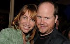 Kai Cole and Joss Whedon appear at a 2010 L.A. premiere event.