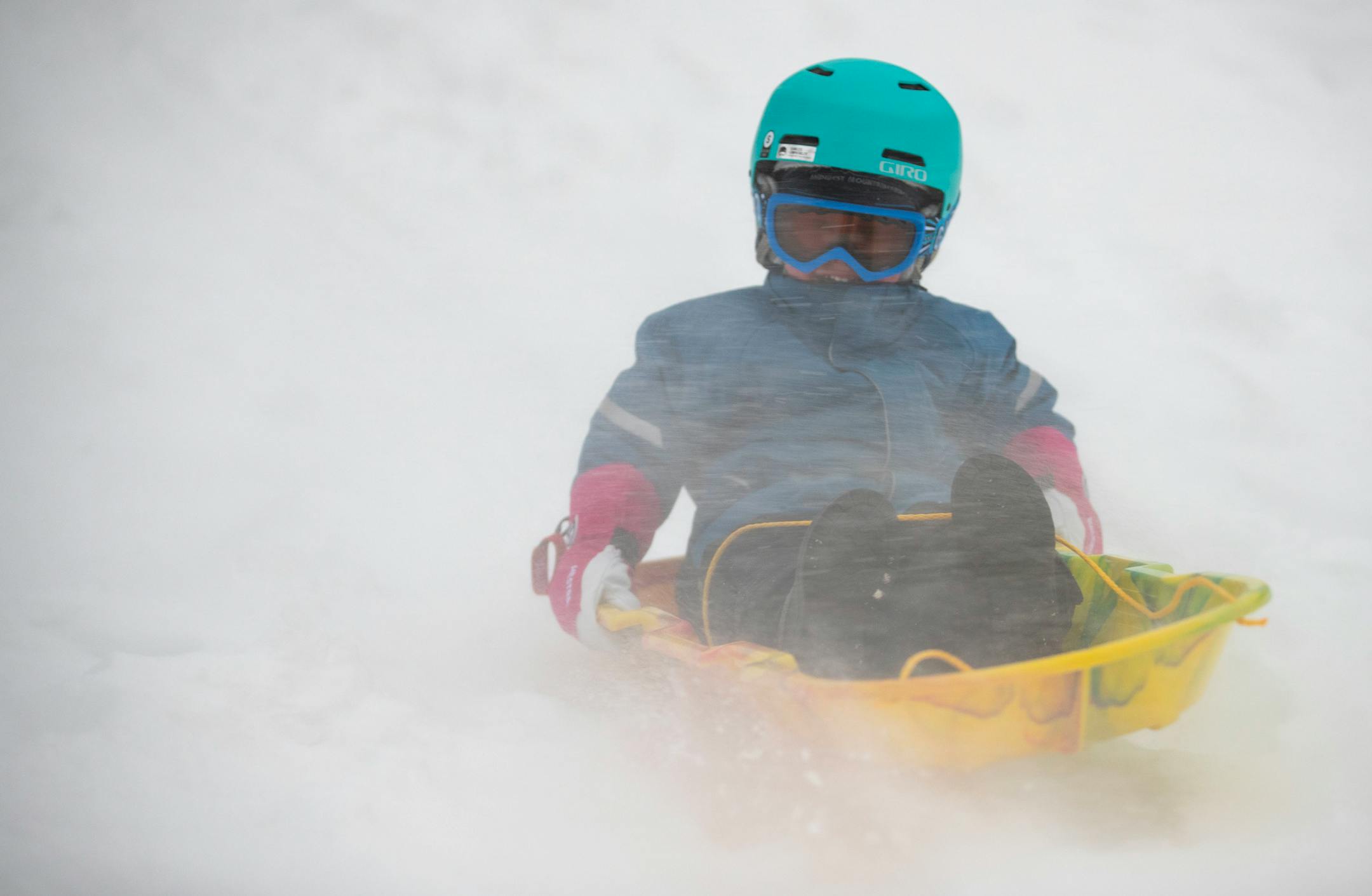 Sam Nelson, 3, went sledding outside of Highland Chateau apartment complex on Wednesday afternoon.