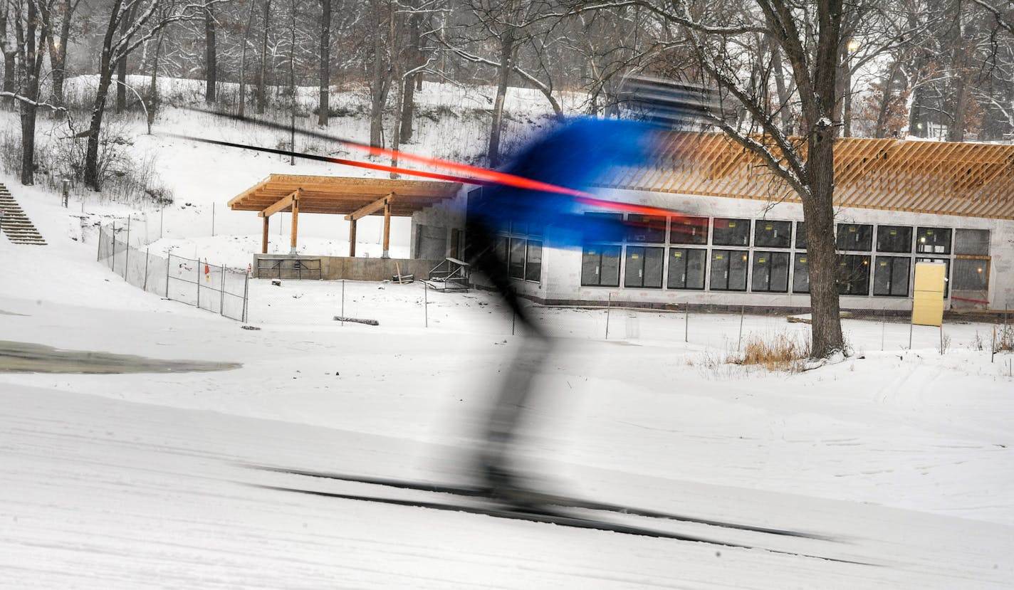 A cross-country skier streaked past the Trailhead, the year-round lodge that's being built at Theodore Wirth Park. It will rent equipment for all four seasons of activities.