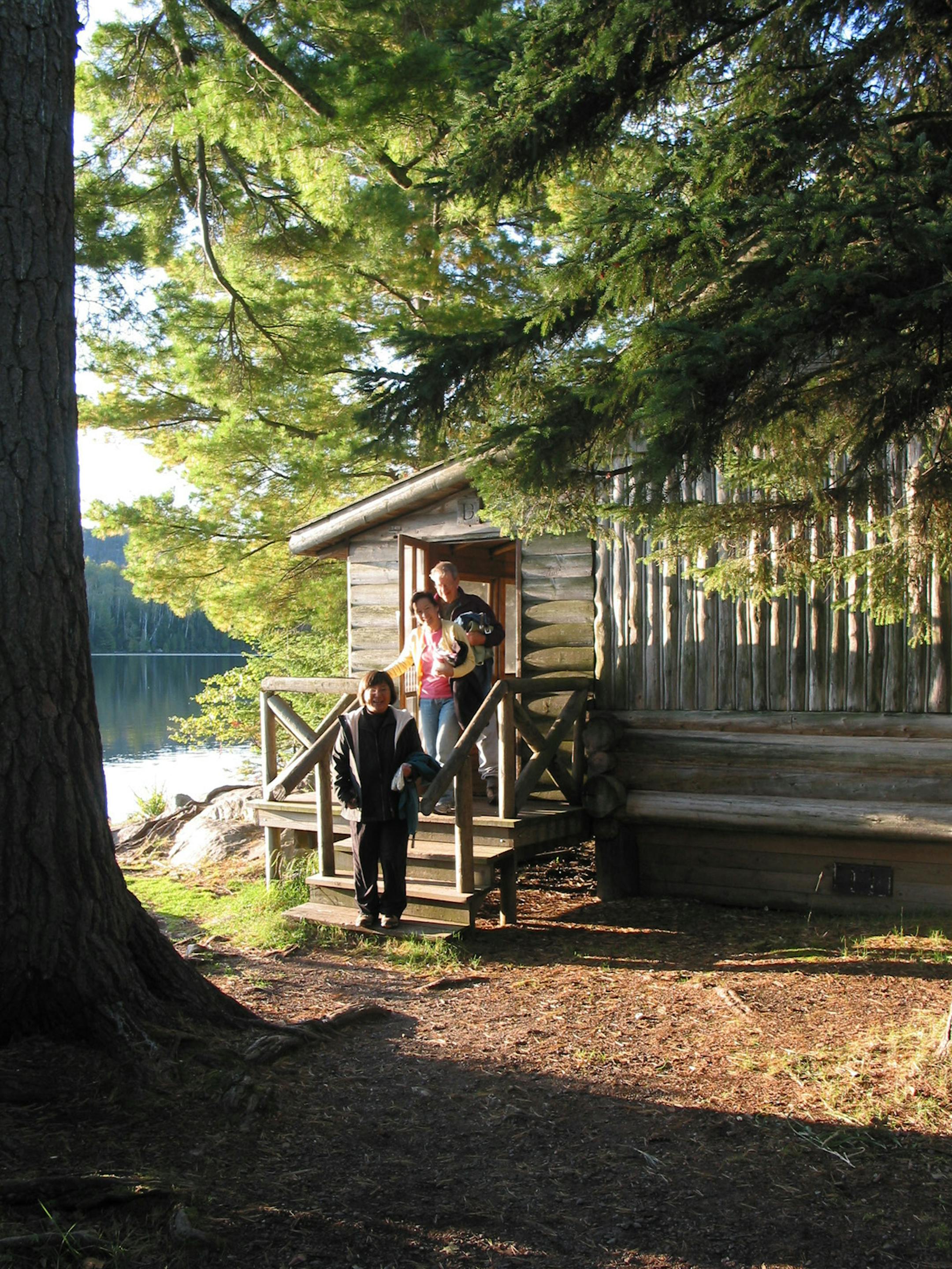 Visitors to the walk-in cabins at Tettegouche State Park set out for a hike. The park has 23 miles of trails.