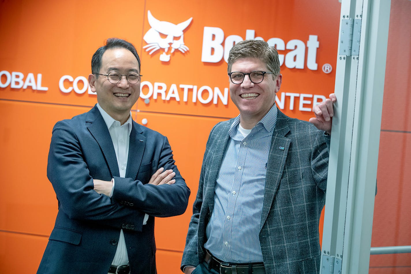 CEO Scott Park flew from Seoul to open Bobcat's new Global Collaboration Center in Minneapolis. At right is Alvaro Pacini, who will oversee the center.