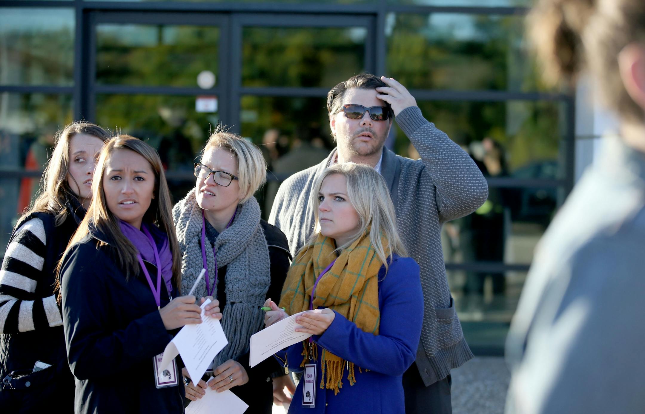 Paisley Park tour officials and employees wait for the first tour guests to arrive by bus at Paisley Park Thursday, Oct. 6, 2016, in Chanhassen, MN.