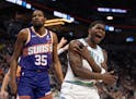 Wolves guard Anthony Edwards (5) reacts after a non-call on Suns forward Kevin Durant during the regular-season finale.
