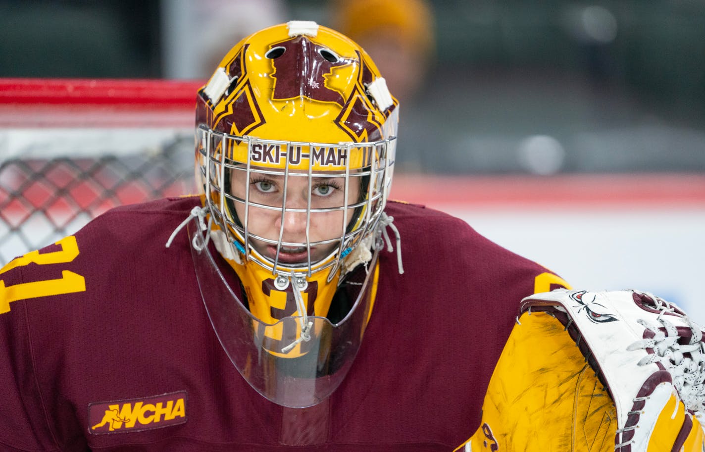 Minnesota goaltender Skylar Vetter (31) stands in ready position as St. Thomas attempts to get a shot off in the second period Friday, Oct. 13, 2023, at Xcel Energy Arena in St. Paul, Minn. ]