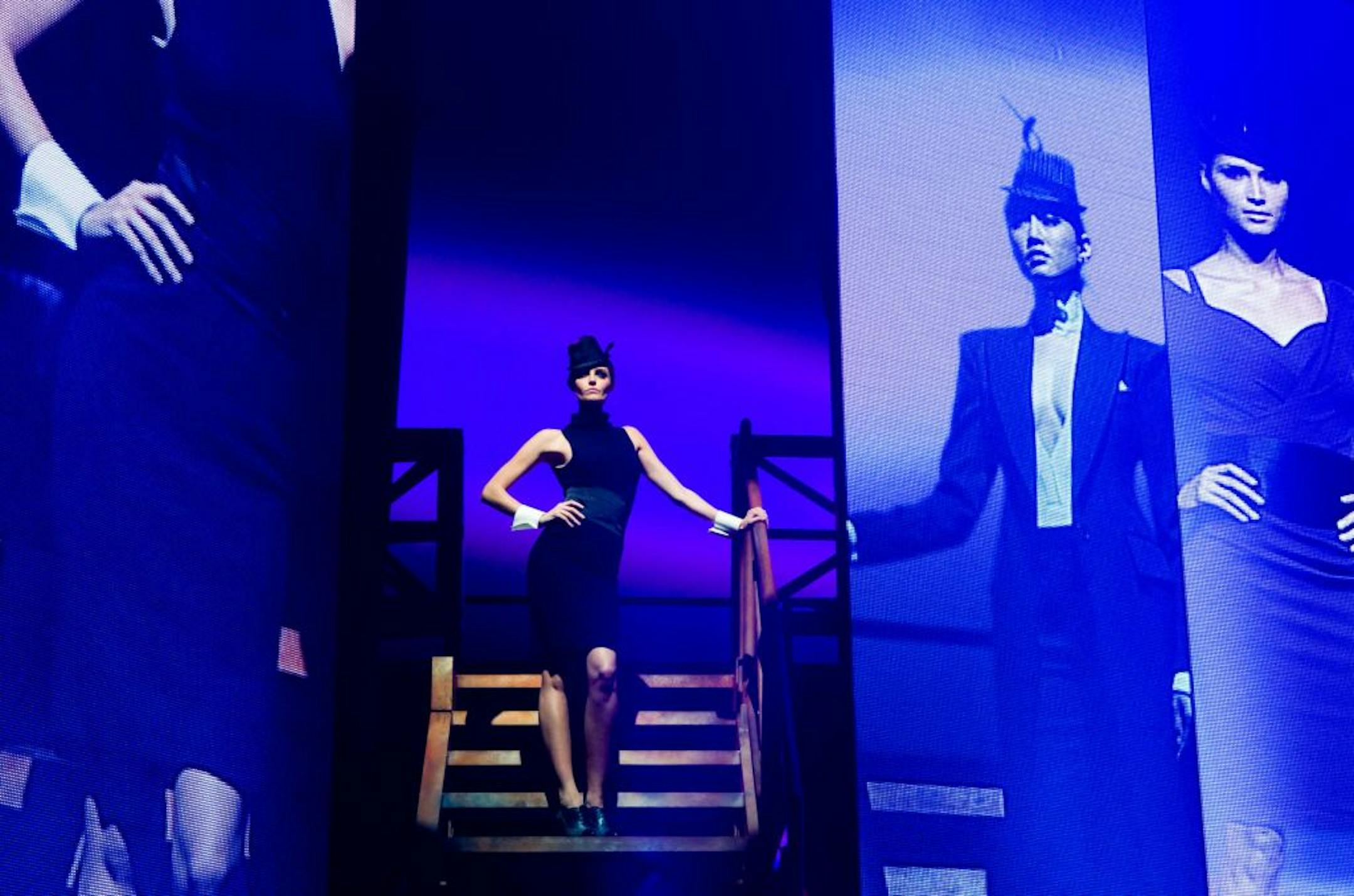A model descends stairs during Glamorama