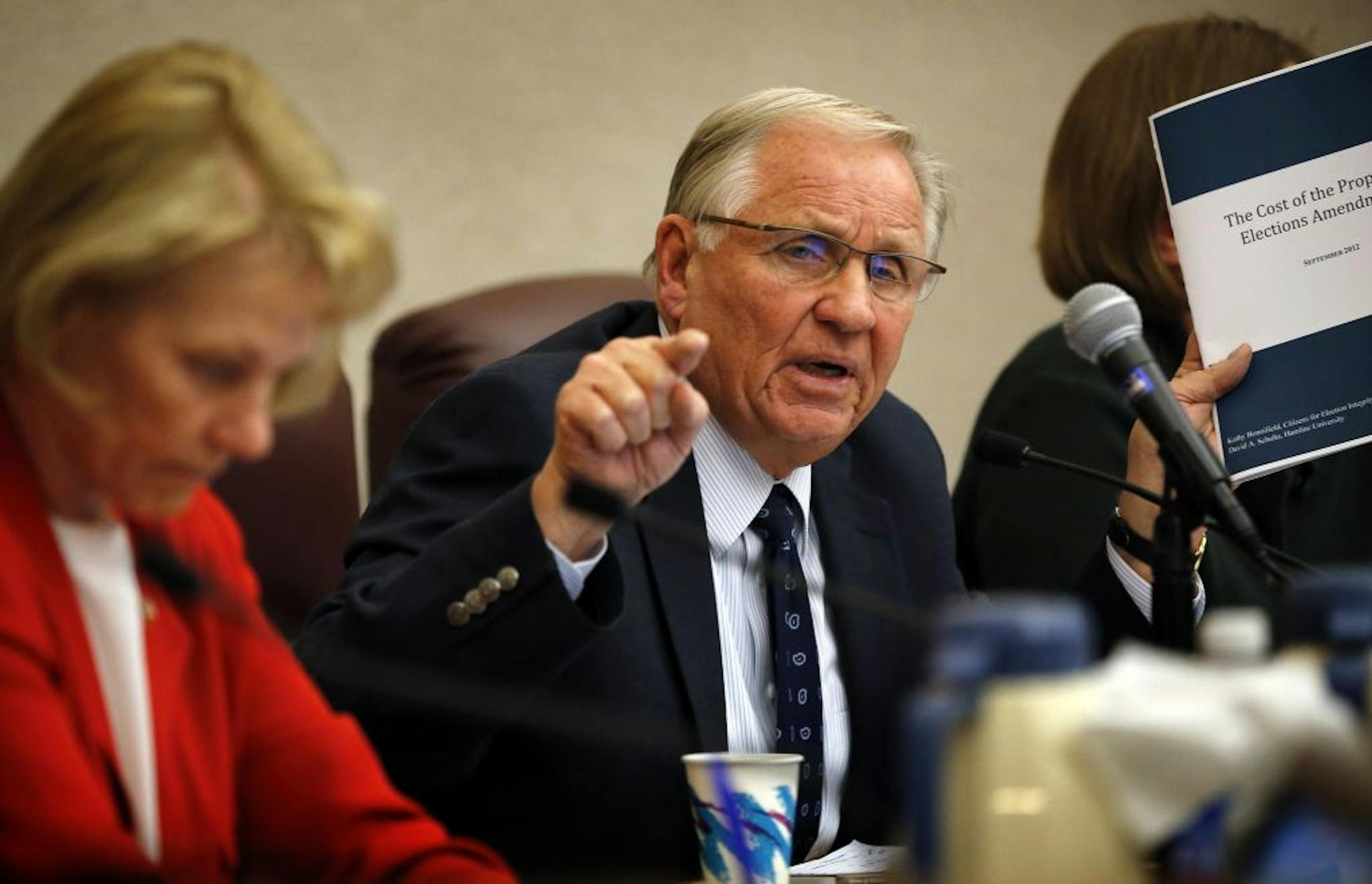 Former Gov. Arne Carlson argued his point during a Tuesday night debate in Maplewood.