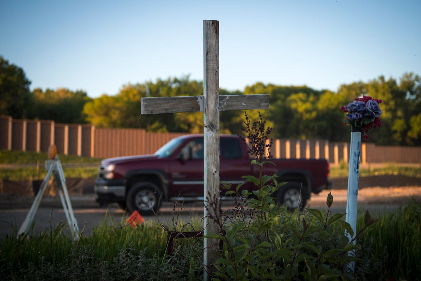 A road-side memorial for Gina Morri, who was run over by a dump truck several years ago near Country Drive and Spruce Street in Little Canada.