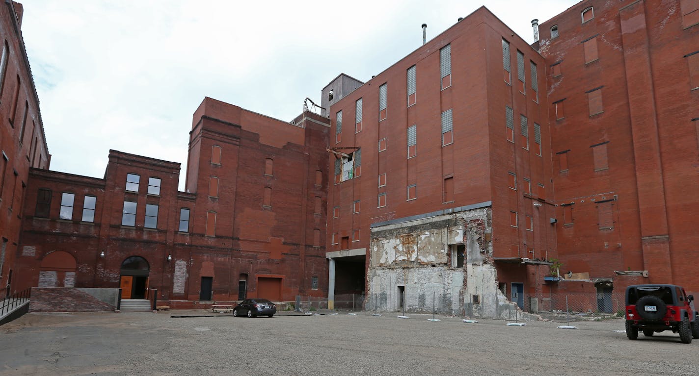 The old Hamm's brewery building is getting back in the booze game, with 11 Wells Distillery and Flat Earth Brewing now up and running -- "Hamm's building brews anew."] Bruce Bisping/Star Tribune bbisping@startribune.com