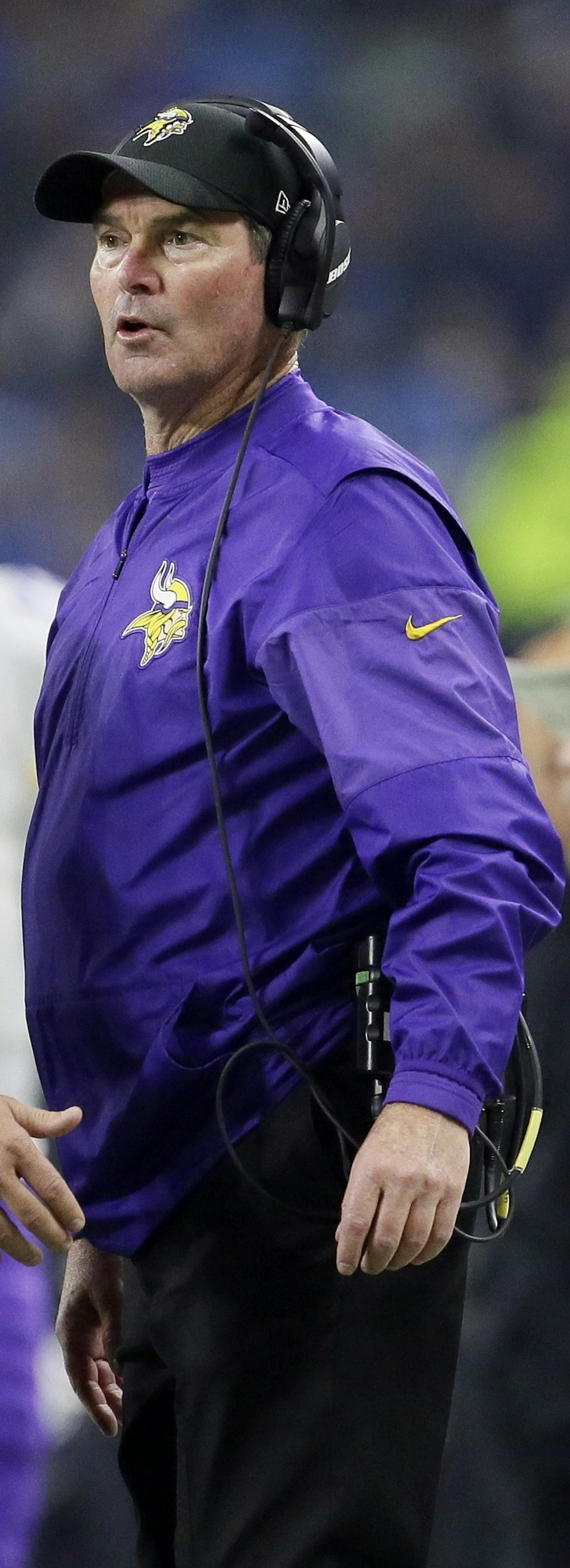 Minnesota Vikings head coach Mike Zimmer talks with field judge Brad Freeman during the second half of an NFL football game against the Detroit Lions, Thursday, Nov. 24, 2016 in Detroit. (AP Photo/Duane Burleson)