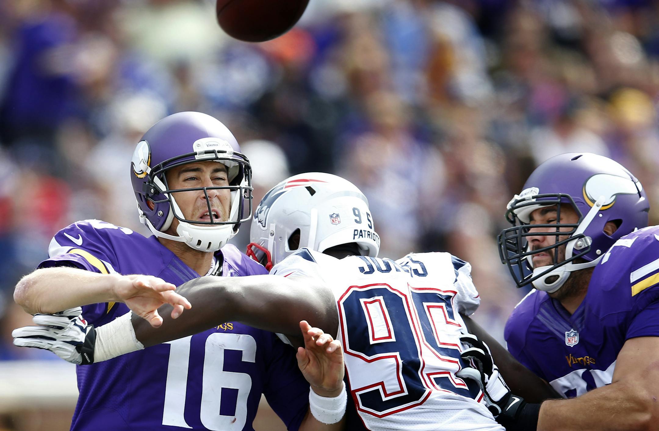Vikings quarterback Matt Cassel (16) was pressured by Chandler Jones (95) in the fourth quarter. ] CARLOS GONZALEZ cgonzalez@startribune.com - September 14 , 2014 , Minneapolis, Minn., NFL, TCF Bank Stadium, Minnesota Vikings vs. New England Patriots