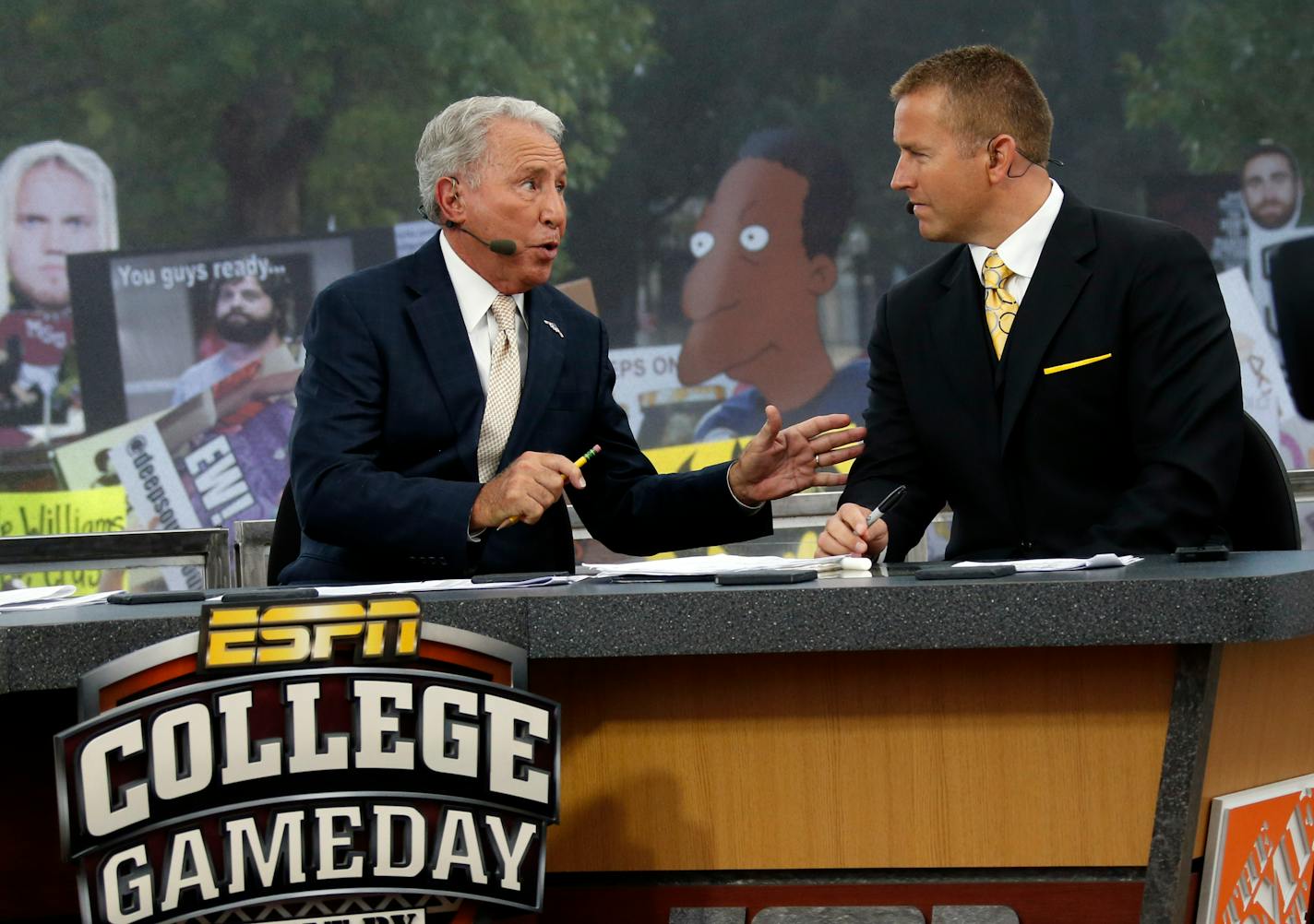 FILE - In this Oct. 11, 2014, file photo, ESPN College GameDay hosts Lee Corso, left, and Kirk Herbstreit