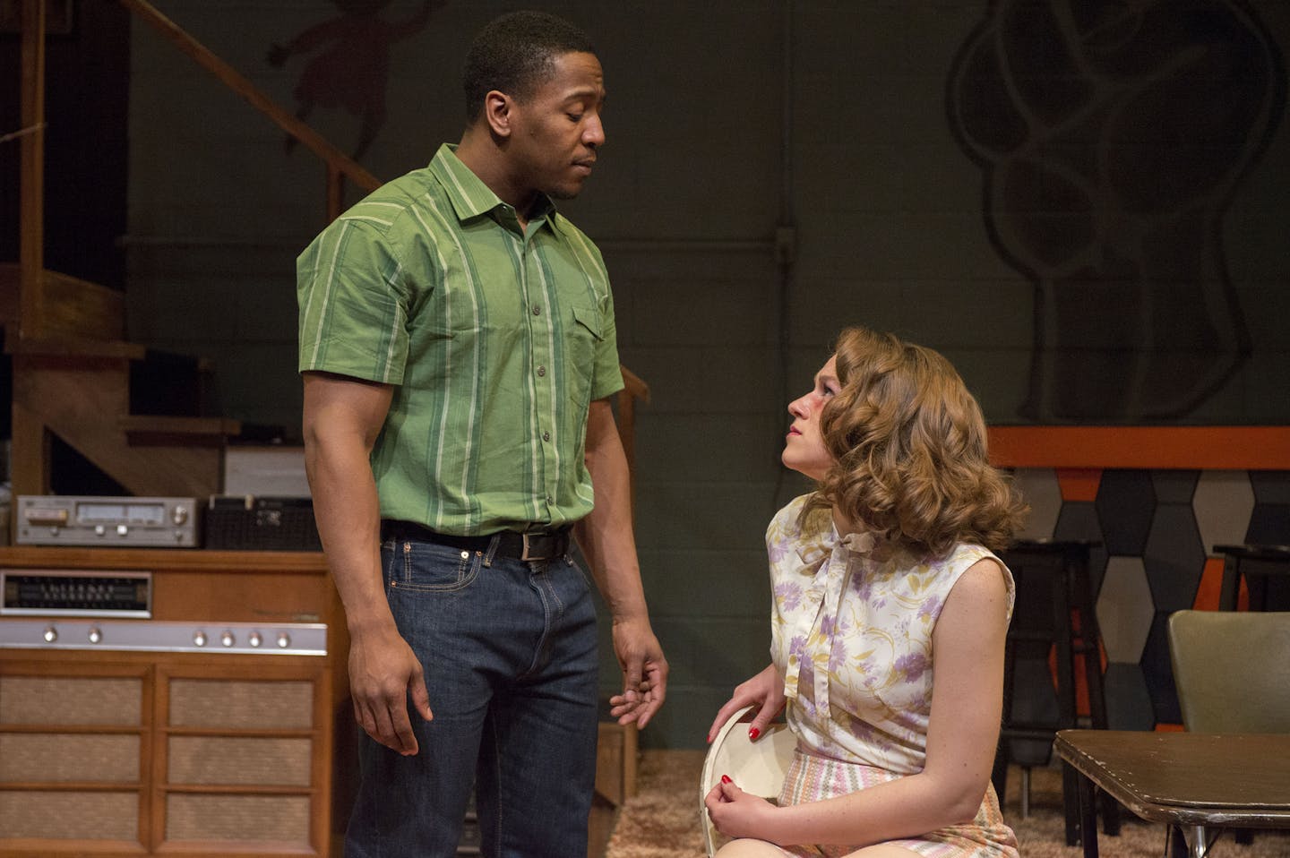 Caroline, played by Elizabeth Eftland, looks up to Lank, played by Darius Dotch, while they share a moment. ] BRIDGET BENNETT SPECIAL TO THE STAR TRIBUNE &#x2022; bridget.bennett@startibune.com During a rehearsal for Detroit '67 at Penumbra Theatre in St. Paul on April 17, 2015.