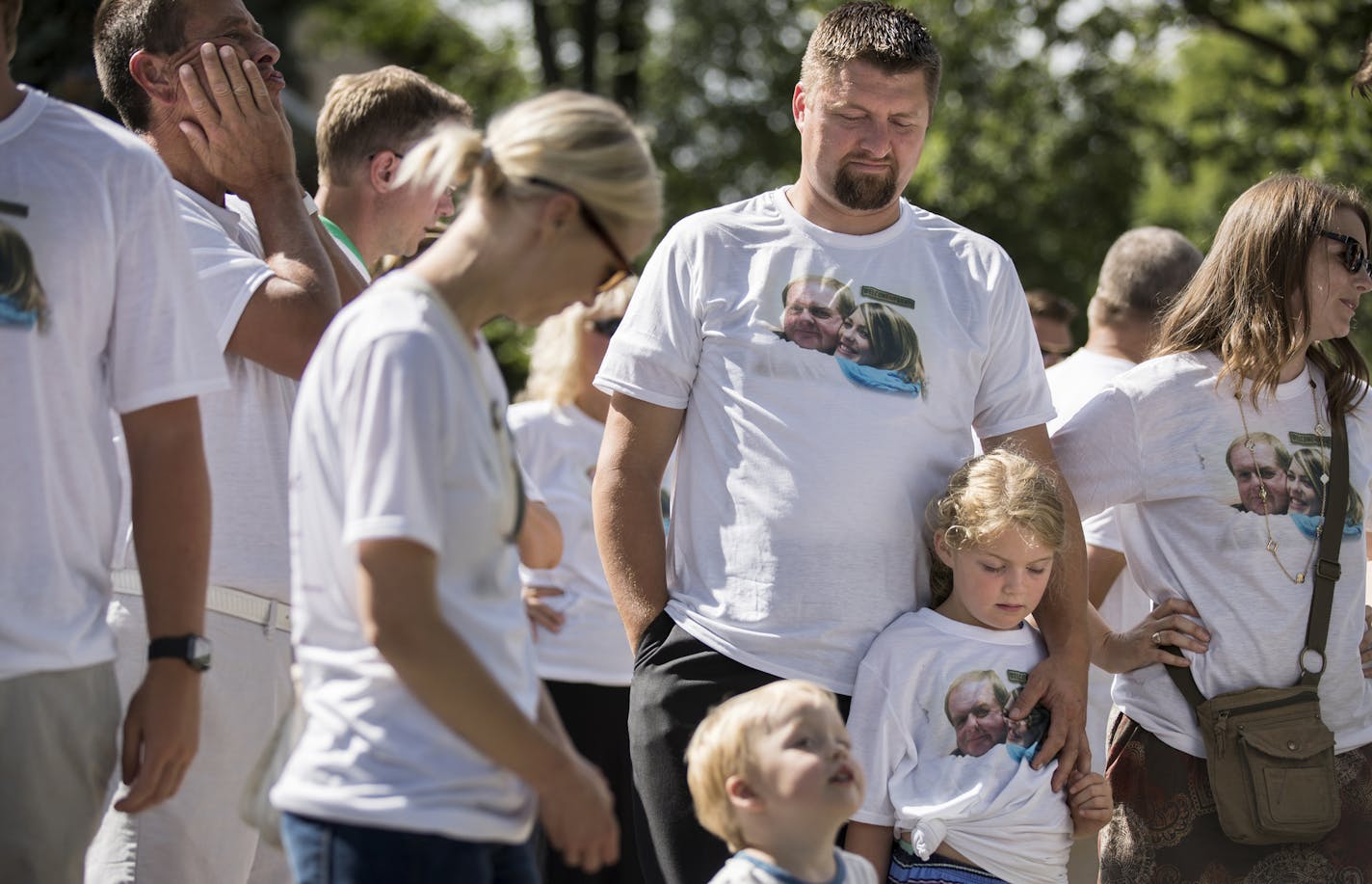 Family and friends gather during a memorial for Jessica Hanson in Minneapolis. ] (Leila Navidi/Star Tribune) leila.navidi@startribune.com BACKGROUND INFORMATION: The family of Jessica Hason, 24, a cyclist who was hit and killed by a motorist at 28th Street and Pleasant Avenue in Minneapolis three years ago, holds a memorial for Jessica where she was killed on Tuesday, July 19, 2016. The driver will be sentenced today.