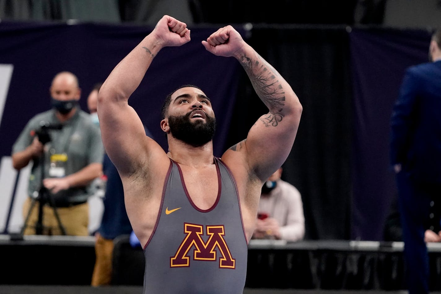 Gable Steveson celebrates after defeating Michigan's Mason Parris during their NCAA wrestling title match in St. Louis.