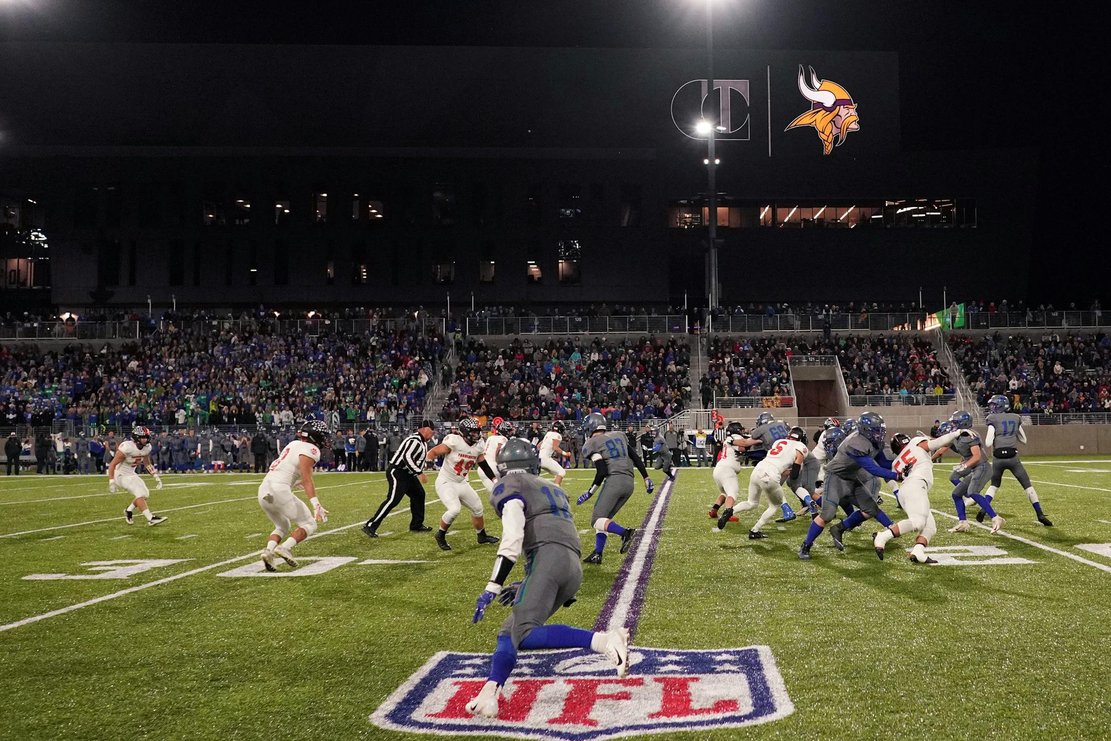 Eagan and Farmington played under the lights at TCO Stadium
