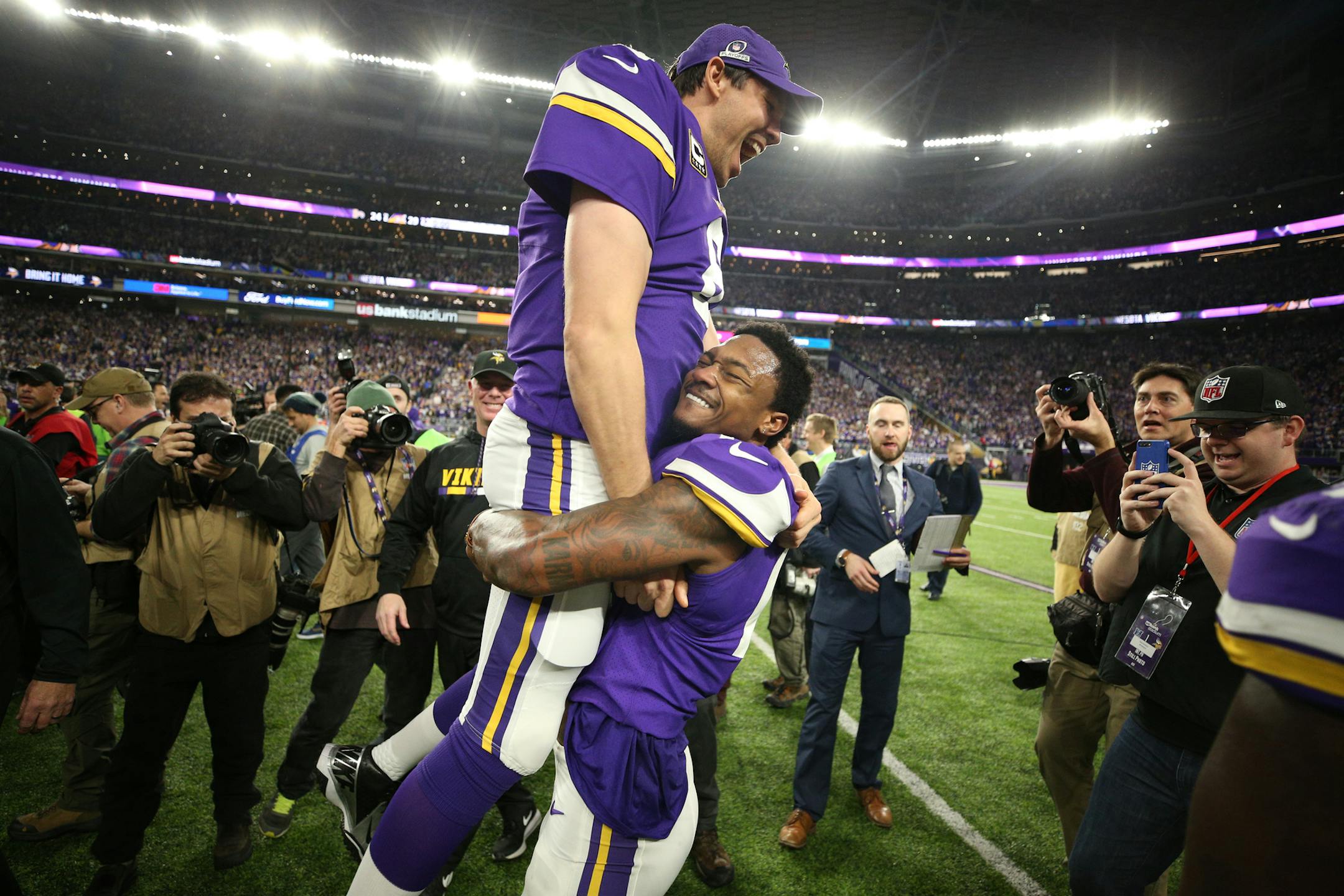 Vikings quarterback Sam Bradford was hoisted up by a jubilant Stefon Diggs after Diggs made a game-winning 61-yard touchdown catch on the last play of Sunday's NFC divisional playoff game at U.S> Bank Stadium. ] JERRY HOLT Ô jerry.holt@startribune.com The Minnesota Vikings faced the New Orleans Saints in an NFL divisional playoff game Sunday afternoon, January 14, 2018 at U.S. Bank Stadium in Minneapolis.