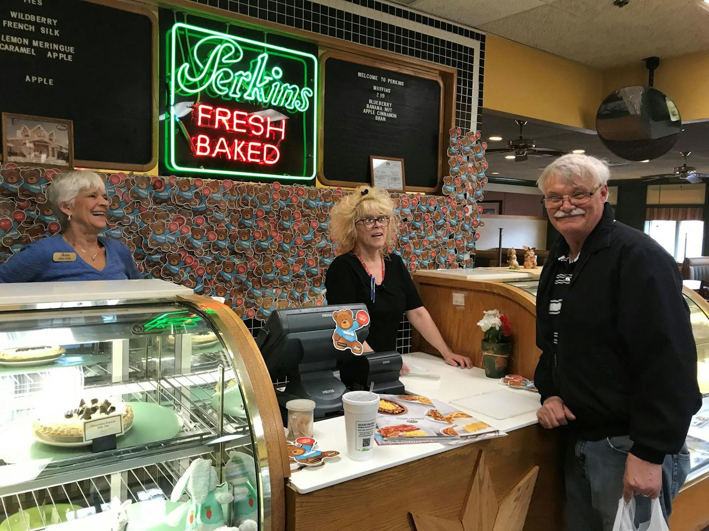 Owner Deb Pedro and staff likeTracy Korhonen at this Maplewood Perkins know their regulars so well, families as them to call if someone doesn't show up for breakfast. Even during the shutdown, regulars like Richard Bennett drop by for takeout. Photo credit: Jacqueline Hanson