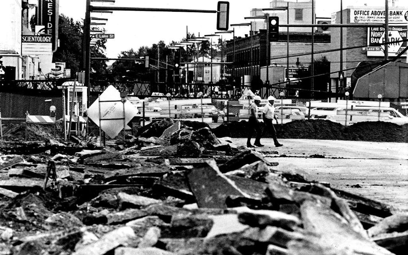 Nicollet Av. closed in July 1977 between 29th and Lake Sts. to allow construction of a shopping center scheduled to include a Kmart store.