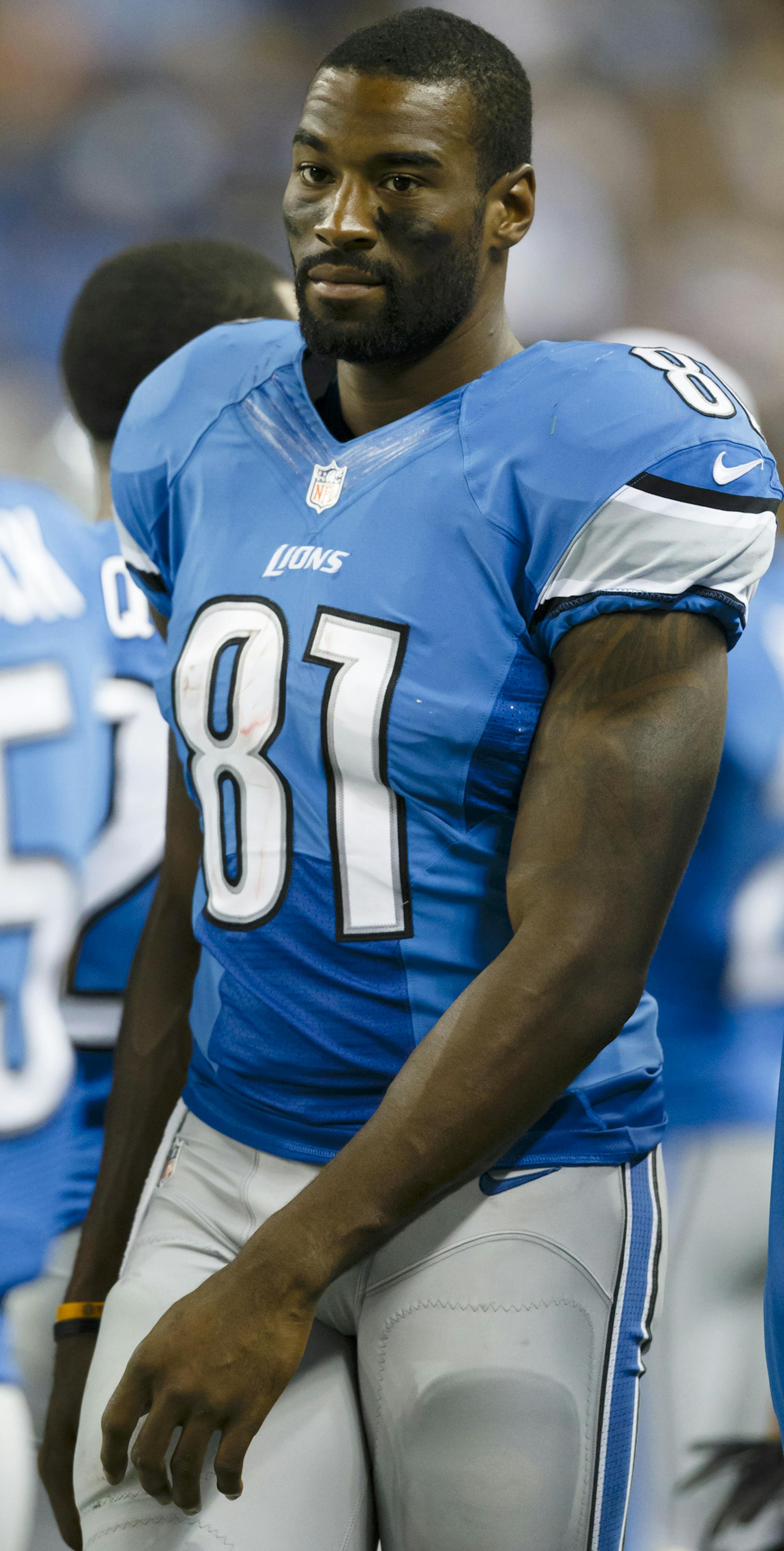 Detroit Lions wide receiver Calvin Johnson (81) on the sideline against the New York Jets during an NFL football game in Detroit, Friday, Aug. 9, 2013. (AP Photo/Rick Osentoski) ORG XMIT: MIN2013090623391834
