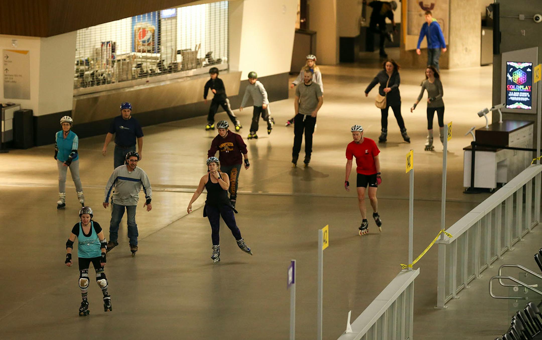 Skaters of all abilities rollered around the concourse of U.S. Bank Stadium Tuesday night. ] JEFF WHEELER ï jeff.wheeler@startribune.com Inline skating has begun in the concourse of U.S. Bank Stadium with more dates added through March 2017 due to popular demand. Hundreds of people skated during the family period from 5- 7 p.m. Tuesday night, December 27, 2016.