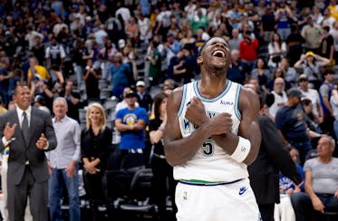 Anthony Edwards celebrates as the Timberwolves beat the Denver Nuggets in Game 7 of the NBA Western Conference semifinals Sunday night at Ball Arena i