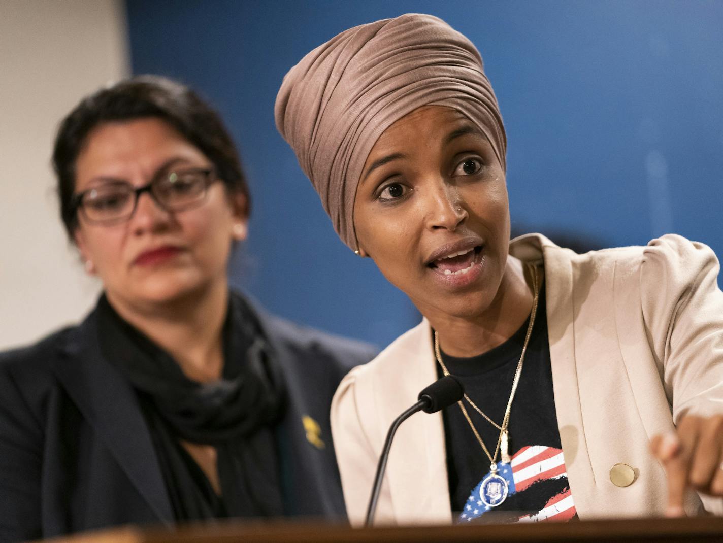 Rep. Ilhan Omar, right, with Rep. Rashida Tlaib, D-Mich., at her side, were joined at Monday's news conference by Minnesotans who have been affected by Israel's travel policies.