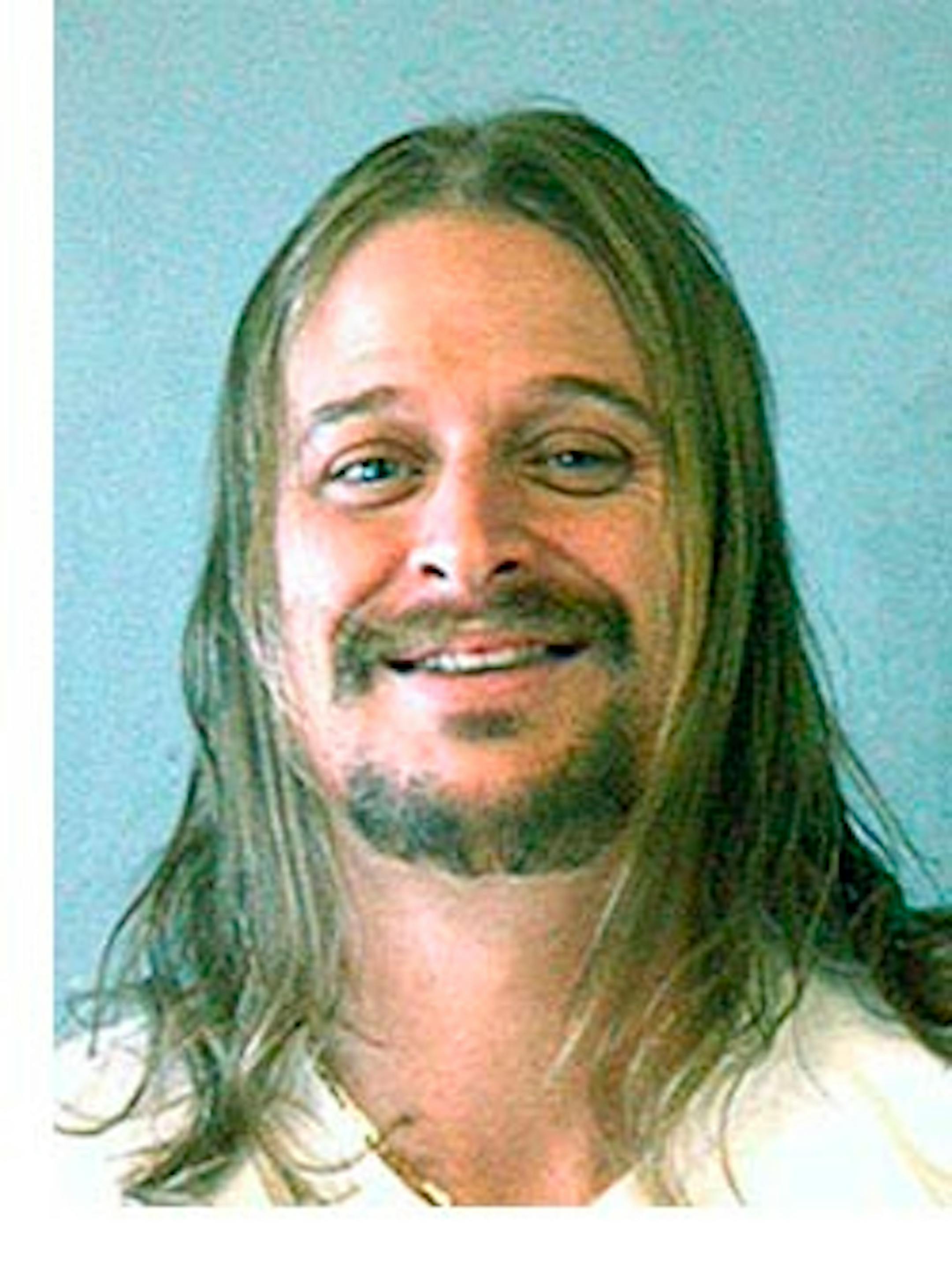 This police mug shot released by the Dekalb Sheriff's Office, shows musician Kid Rock after he was arrested early Sunday morning, Oct. 21, 2007, following a brawl at a Waffle House in Atlanta. Rock, who was in town for a show, was released hours later after posting bond. (AP Photo/Dekalb Sheriff's Office) Dekalb Sheriff's Office LA201 HO People Kid Rock