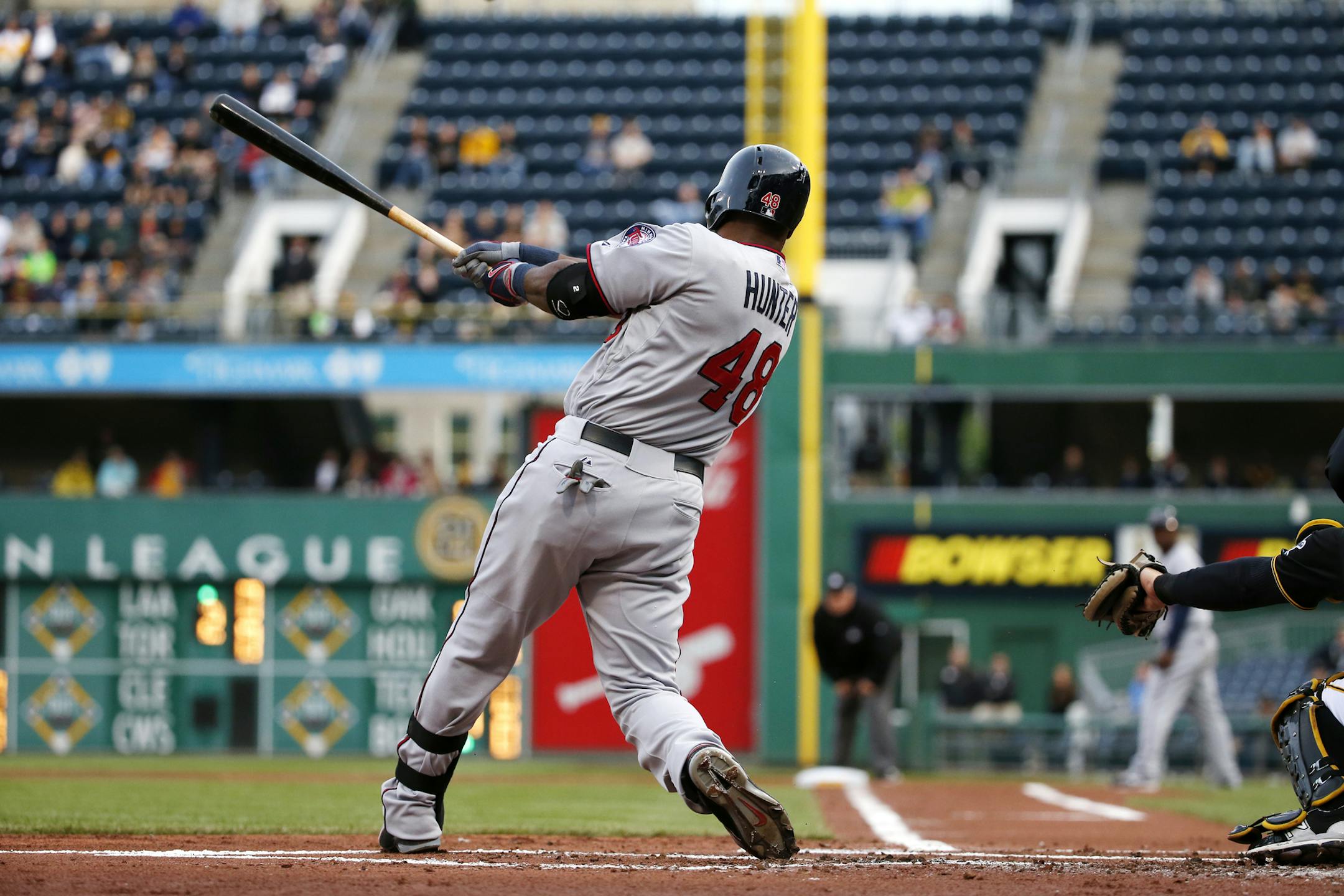 Minnesota Twins' Torii Hunter (48) drives in three runs with a double off Pittsburgh Pirates starting pitcher Jeff Locke during the first inning of a baseball game in Pittsburgh, Wednesday, May 20, 2015. (AP Photo/Gene J. Puskar)