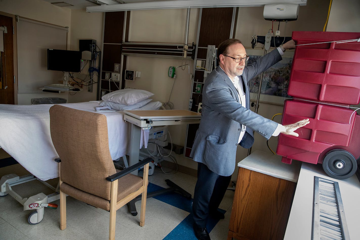 Abbott Northwestern's Director of Facilities Steve Waderich showed off new "High Efficiency Filtration" fan units heading to rooms being prepared Tuesday in Minneapolis.