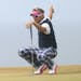 Ian Poulter of England gestures before putting on the 11th green during the final round of the British Open Golf Championship at Muirfield, Scotland, 