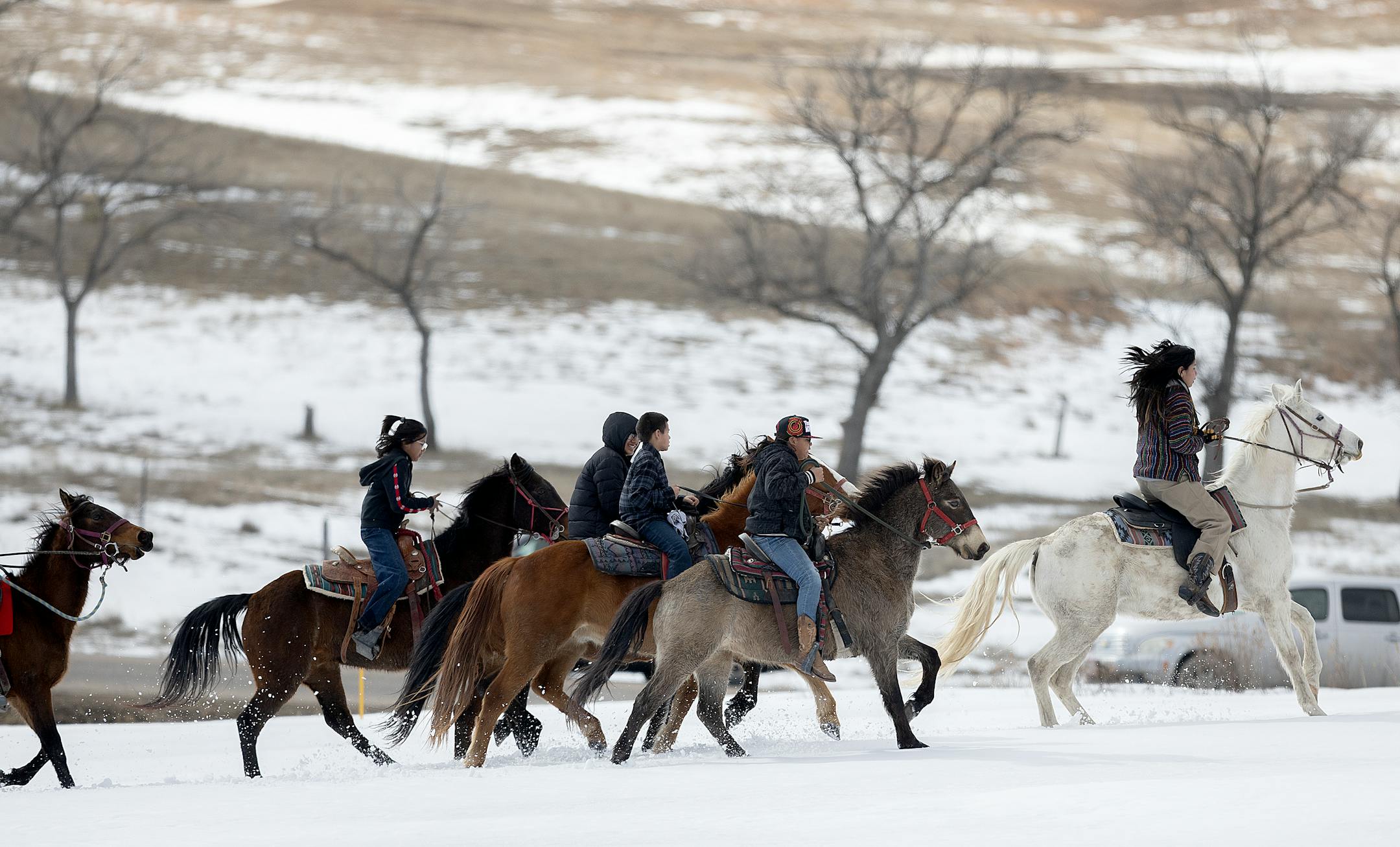 American Indian Movement youth members join the Four Directions March to honor the AIM Warriors of Wounded Knee of 1973 in Wounded Knee, SD on the 50th anniversary.