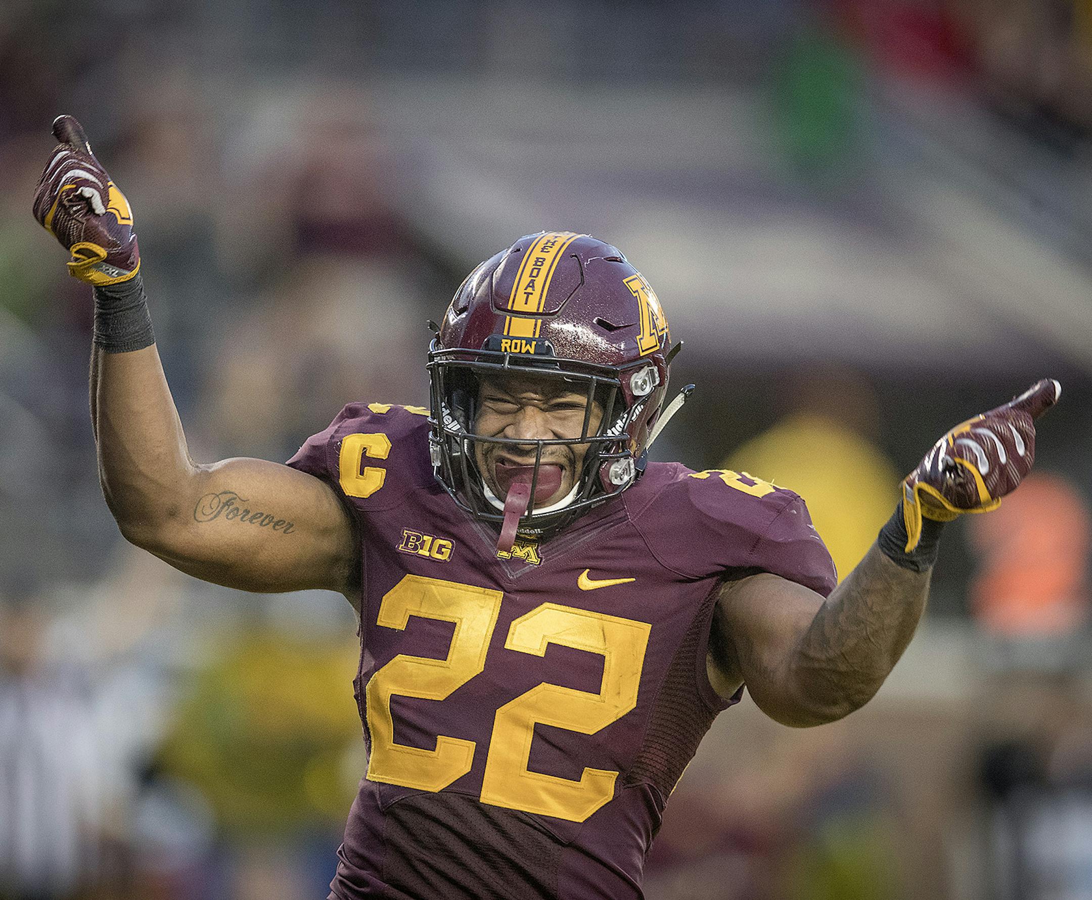 Minnesota running back Kobe McCrary celebrates a 4-yard touchdown run during the fourth quarter against Illinois at TCF Bank Stadium in Minneapolis on Saturday, Oct. 21, 2017. The host Golden Gophers won, 24-17. (Elizabeth Flores/Minneapolis Star Tribune/TNS) ORG XMIT: 1213861