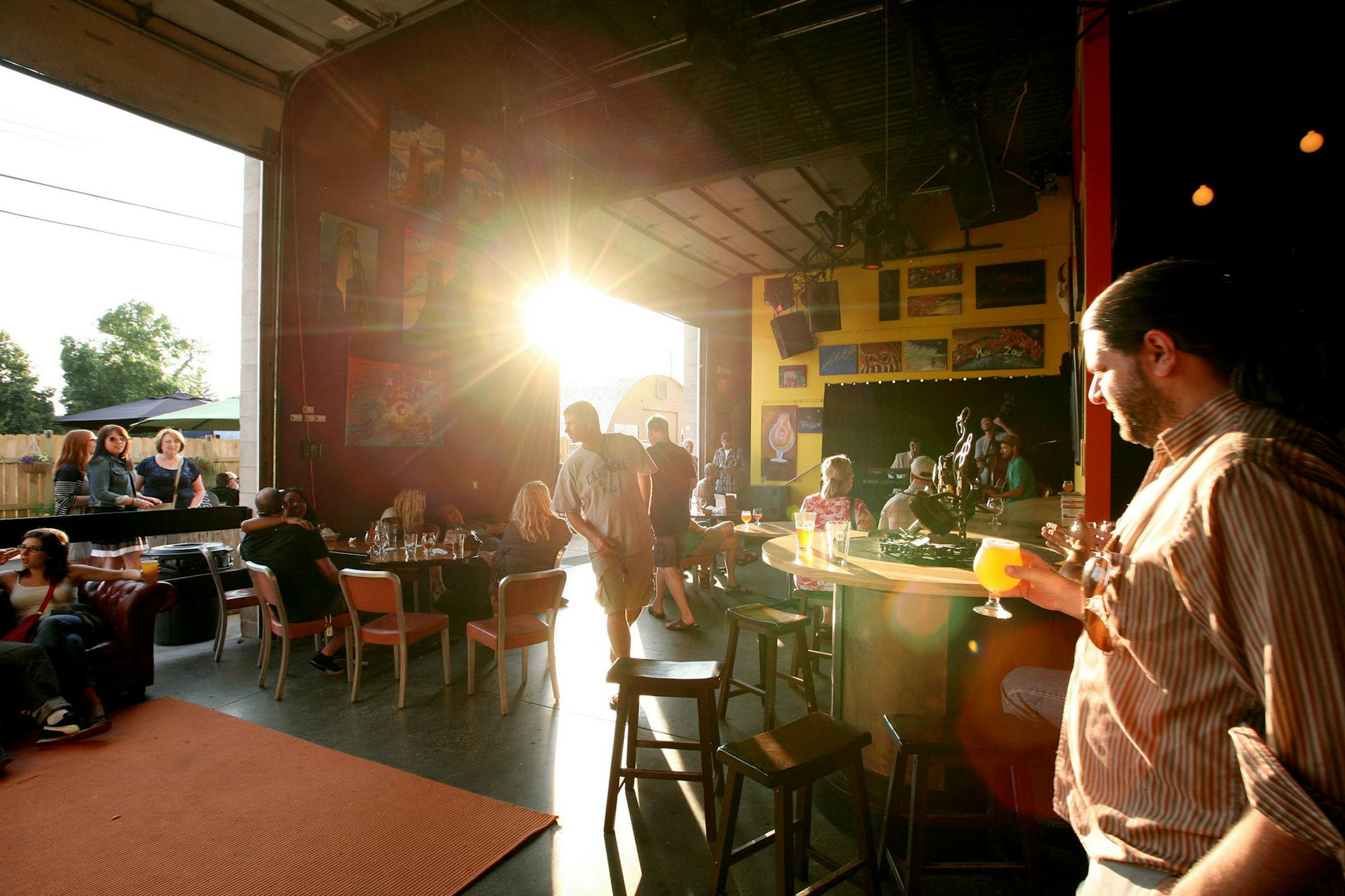 Live music and plenty of sunshine fill the tap room at Harriet Brewing in Minneapolis June 29, 2013. (Courtney Perry/Special to the Star Tribune) ORG XMIT: MIN1307011119560636