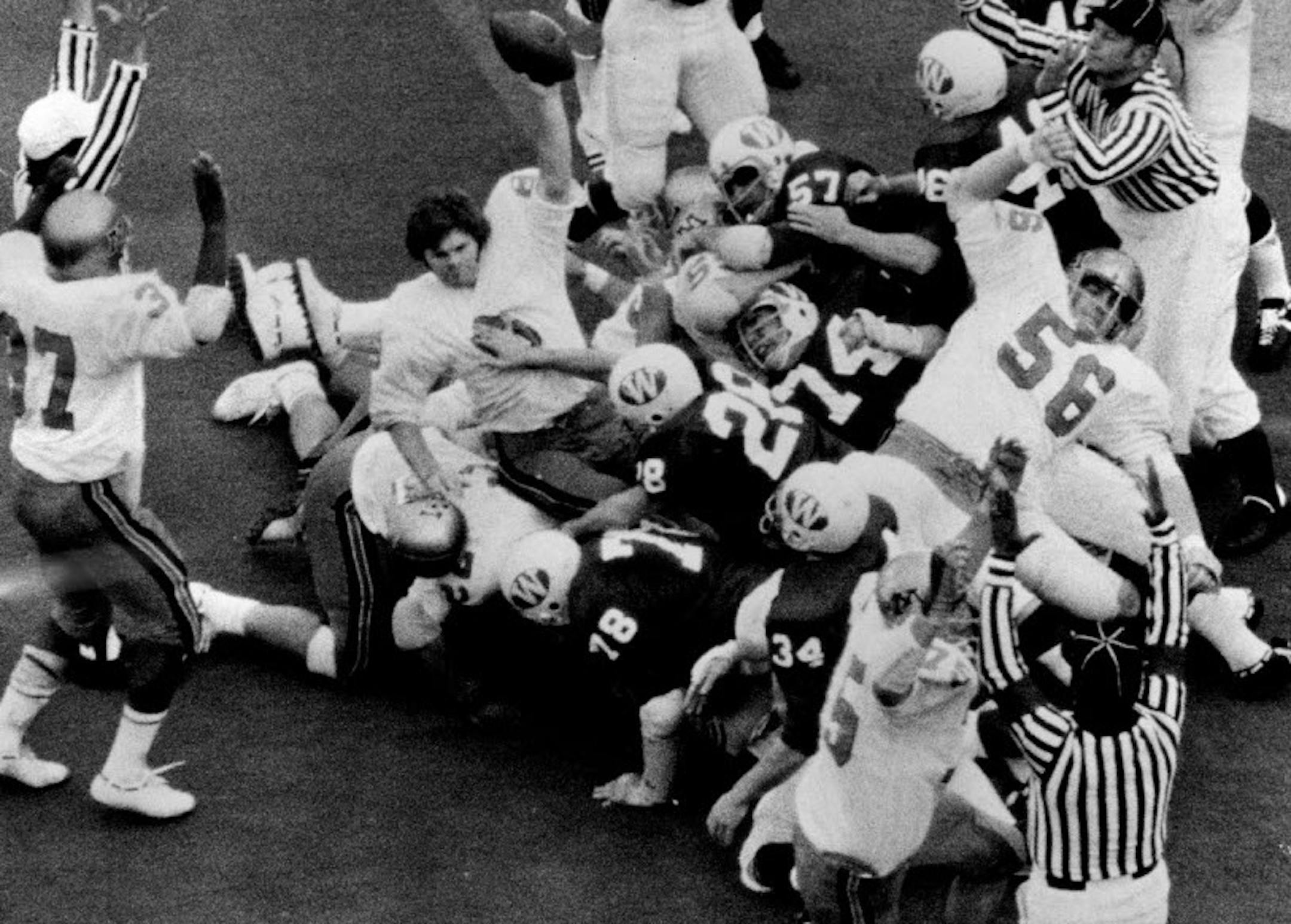 November 26, 1972 Quarterback Bob Morgan lost his helmet but came up with the second touchdown in the Gophers' 14-6 tr.umph over Wisconsin. November 25, 1972 Kent Kobersteen, Minneapolis Star Tribune