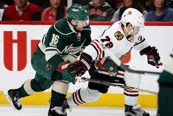Jason Zucker (16) and Artemi Panarin (72) chased the puck in the second period.