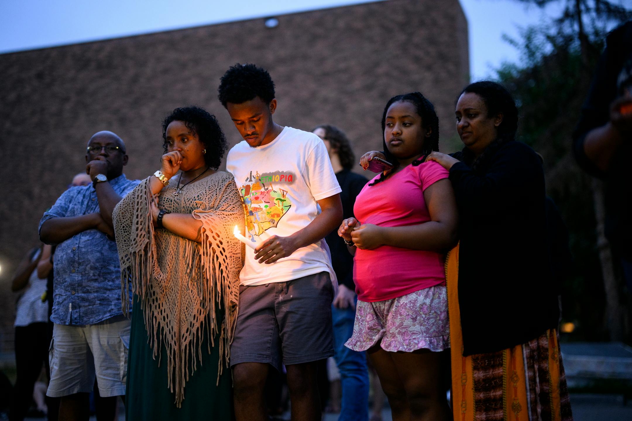 Mourners gathered during a vigil Thursday for 20-year old Andrew Tekle Sundberg.