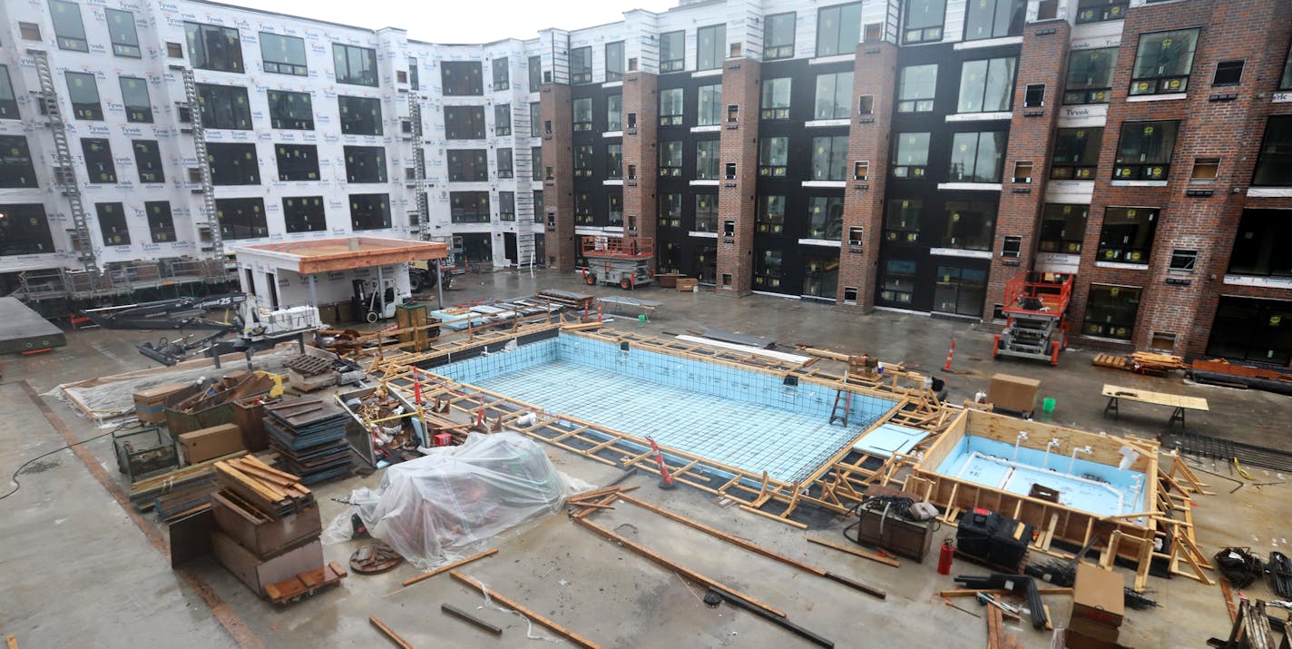 A view of the courtyard with swimming pool and whirlpool in the 25-story Expo apartment tower under construction by Doran Development Wednesday, Sept, 11, 2019, in Minneapolis, MN.] DAVID JOLES &#x2022; david.joles@startribune.com As crews pour the top floor of the 25-story Expo apartment tower, Doran Development is preparing to break ground on the two adjacent blocks that will include several hundred rentals that will replace research buildings on the former General Mills site.