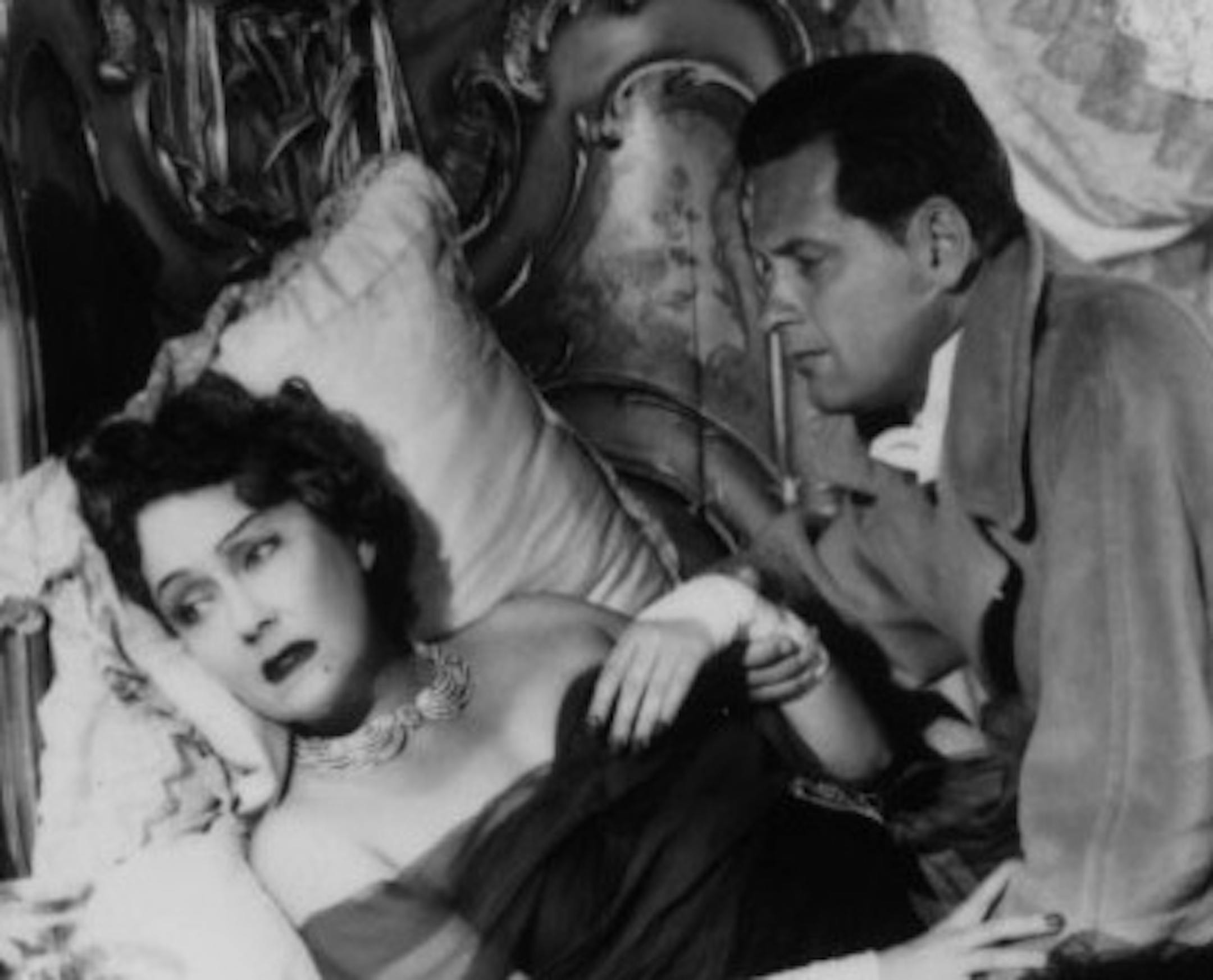 Gloria Swanson (at left) and William Holden star in the Billy Wilder movie classic SUNSET BOULEVARD.
