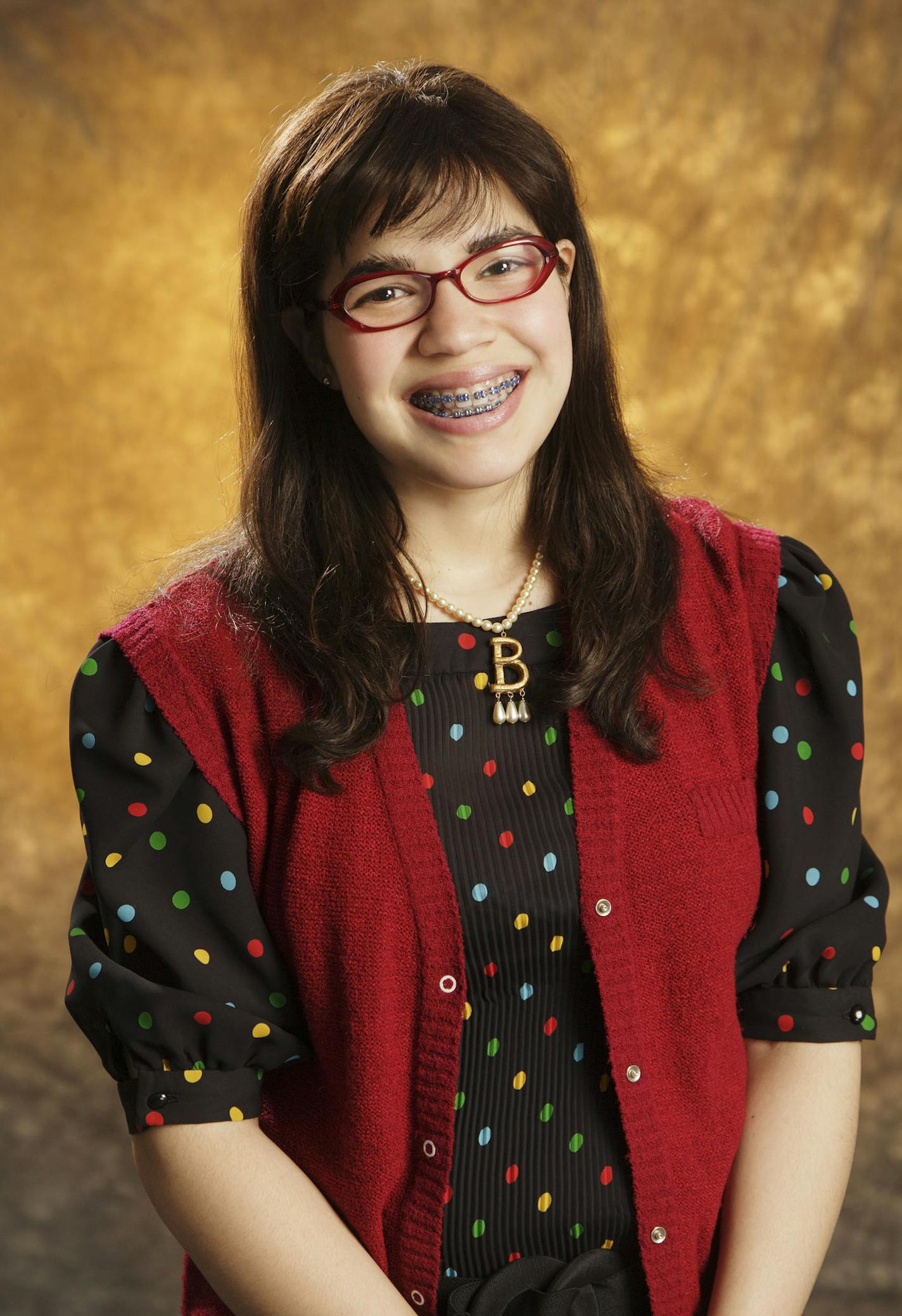 This undated promotional photo, provided by ABC, shows actress America Ferrera as Betty Suarez in the new ABC series "Ugly Betty." "It takes me an hour to become Betty. But I love that she's so different from me," Ferrara, 22, tells TV Guide in its Dec. 18-24 issue. "I can (keep) a bit of myself private." (AP Photo/ABC, Eric Liebowitz) ORG XMIT: NYET163