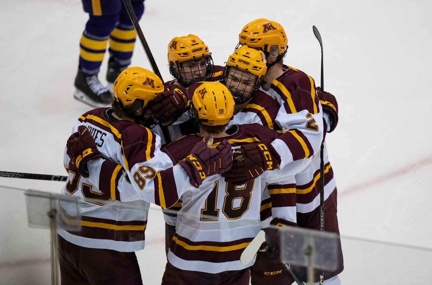 Teammates celebrate with Minnesota forward Jimmy Snuggerud (81) (center) who had just scored his third goal of the game in the third period. The Minnesota Gophers men's hockey hosted the Minnesota State Mavericks on Friday, Oct. 7, 2022 at Mariucci Arena in Minneapolis, Minn. ] RENEE JONES SCHNEIDER • renee.jones@startribune.com