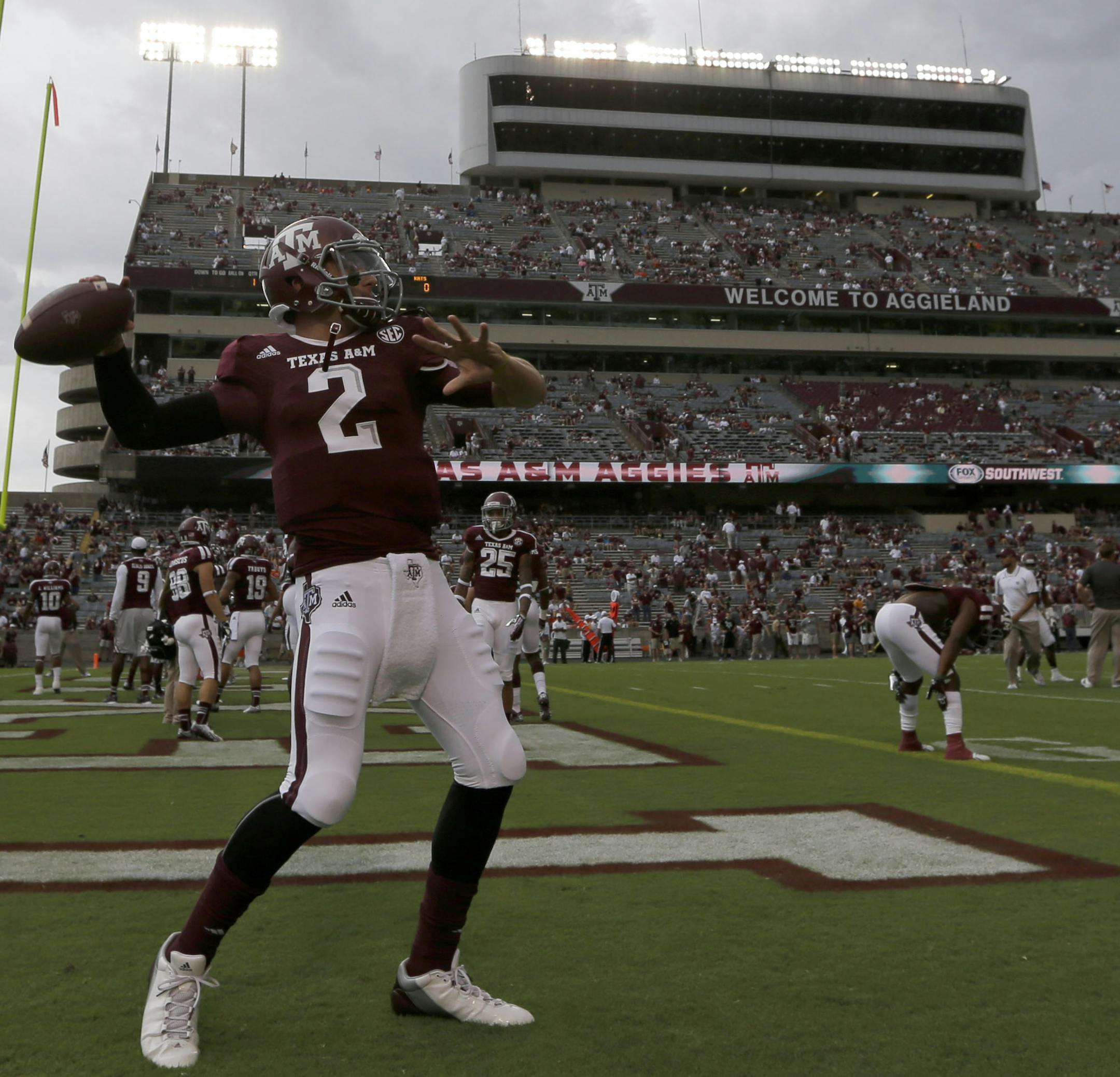 Texas A&M quarterback Johnny Manziel throws a pass before an NCAA college football game against Sam Houston State Saturday, Sept. 7, 2013, in College Station, Texas. (AP Photo/David J. Phillip) ORG XMIT: TXDP1