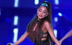 FILE - In this June 2, 2018 file photo., Ariana Grande performs at Wango Tango at Banc of California Stadium in Los Angeles. The singer cried during a