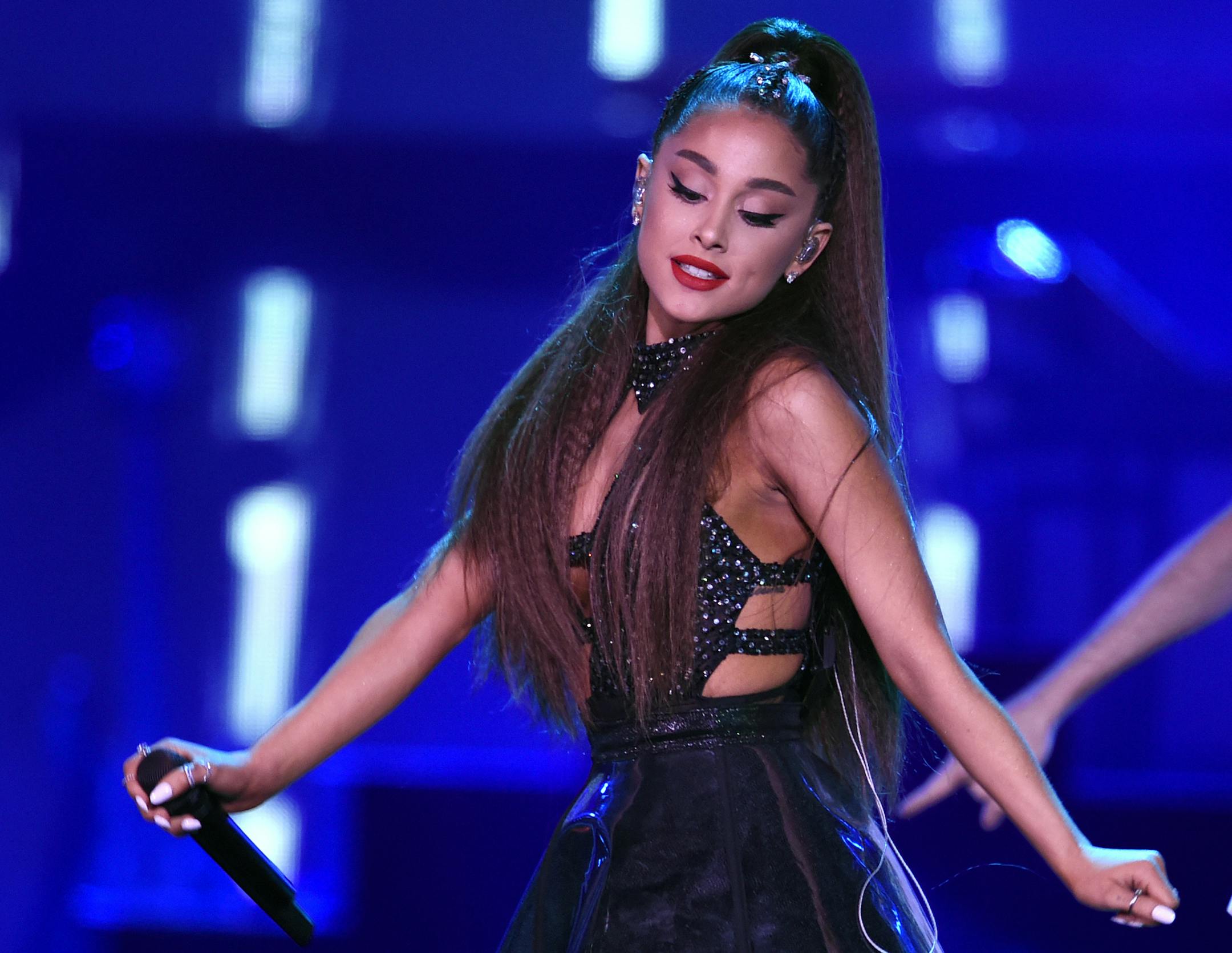 FILE - In this June 2, 2018 file photo., Ariana Grande performs at Wango Tango at Banc of California Stadium in Los Angeles. The singer cried during an interview Friday, Aug. 17, 2018 with Ebro for Beats 1 on Apple Music as she shared thoughts on the 2017 concert in England, when a suicide bomber killed 22 people. She said that terrorists ìwant you to be afraid,î adding that those who just heard about it in the news had moved on. But for her and others, the challenge became just to &#x