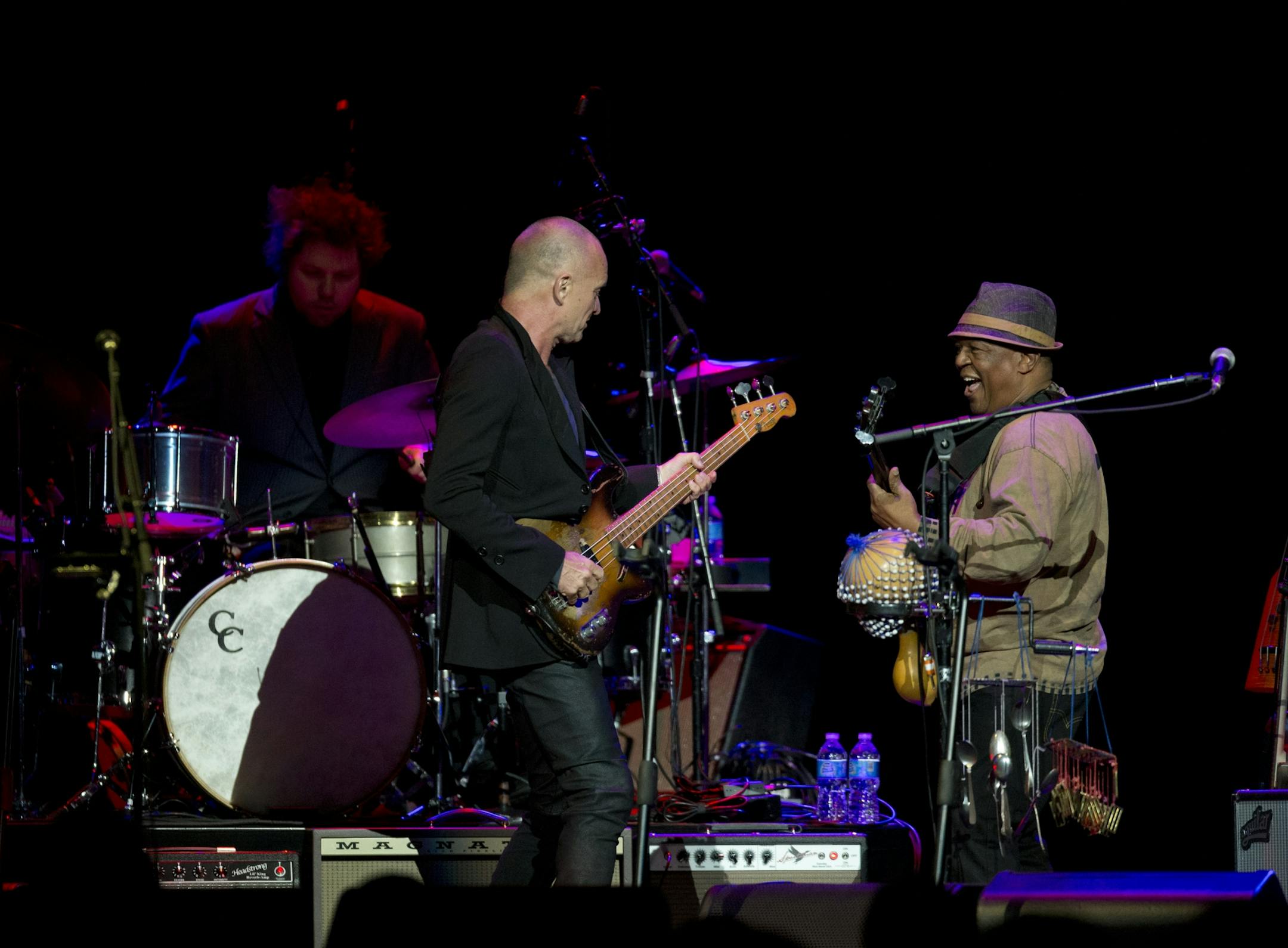 Longtime New York neighbors Sting and Paul Simon decided to hit the road and tour together. The Paul Simon & Sting: On Stage Together tour stopped at Xcel Energy Center in St. Paul Sunday night, February 23, 2014. Sting, left, jammed for a bit with Paul Simon's bass player early in their set Sunday night at Xcel Energy Center.