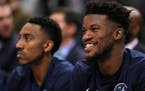 A 7-3 Wolves record sparks a smile in Jimmy Butler, right, who has committed to putting the team first.
