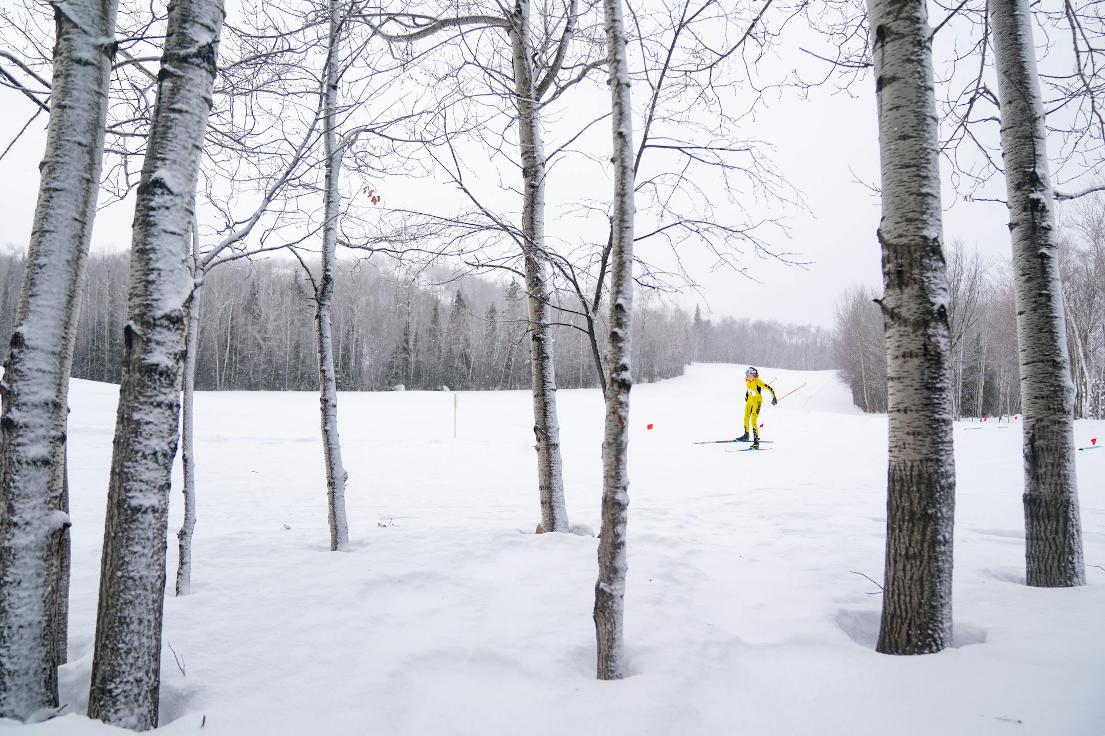 Forrest Lake nordic skier Maria Stockinger (5) competes in the girl's team spring qualification race during the MSHSL Boys and Girls Nordic Ski Racing Meet.