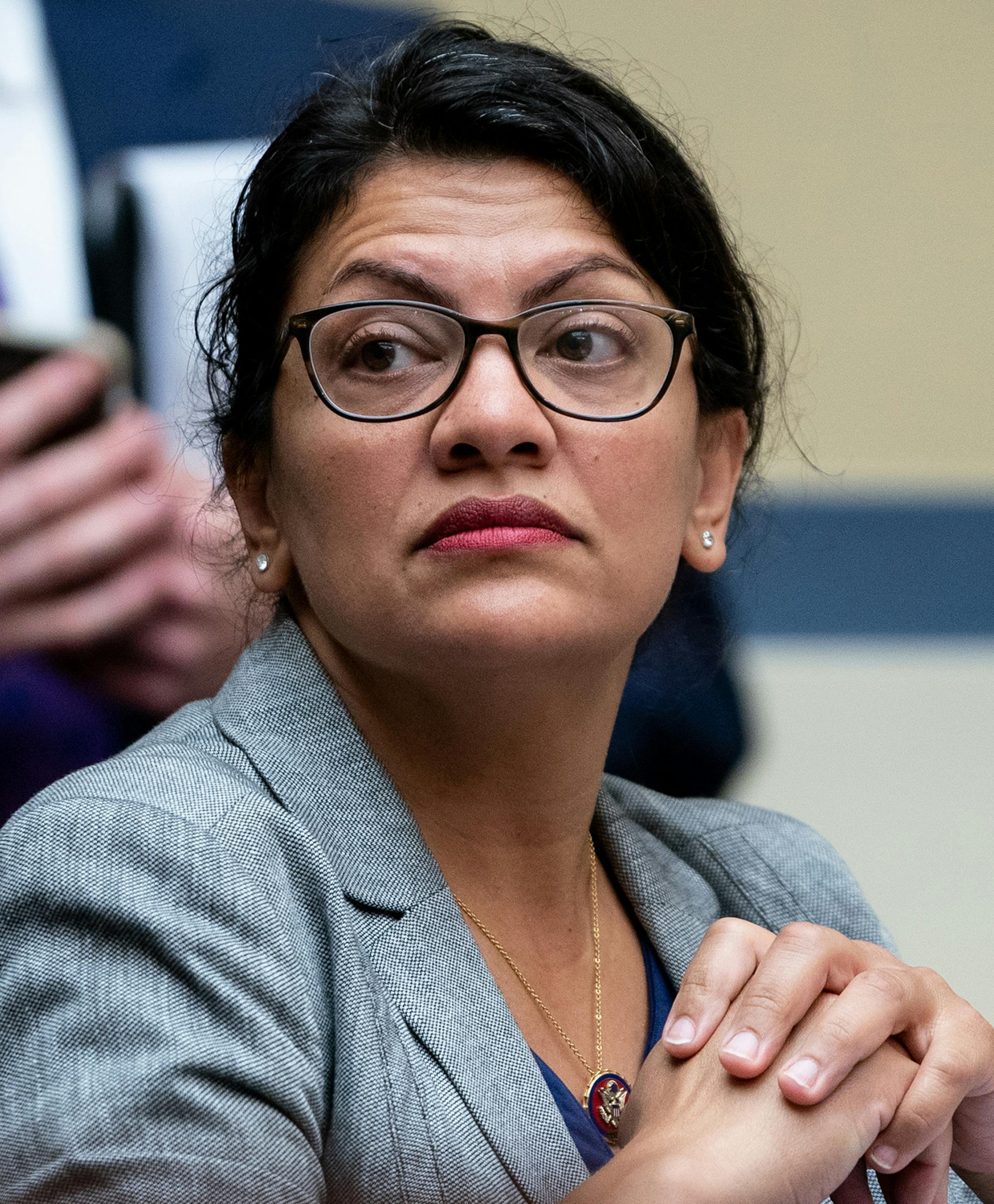 FILE -- Rep. Rashi­da Tlaib (D-Mi­ch.) attends a House Overs­ight and Refor­m Commi­ttee hearing on Capitol Hill in Washington, on July 18, 2019. A day after barring Tlaib under pressure from President Donald Trump, Israel said on Friday, August 16, that she could visit her 90-year-old grandmother, who lives in the occupied West Bank, but only after she agreed in writing not to “promote boycotts against Israel” during her trip. Tlaib reversed course, saying