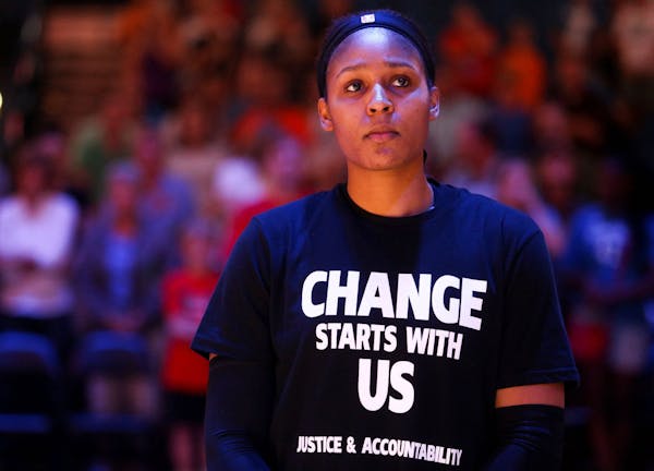 Maya Moore looks on during a moment of silence in July 16 to recognize Philando Castile, who was fatally shot by a Twin Cities police officer during a